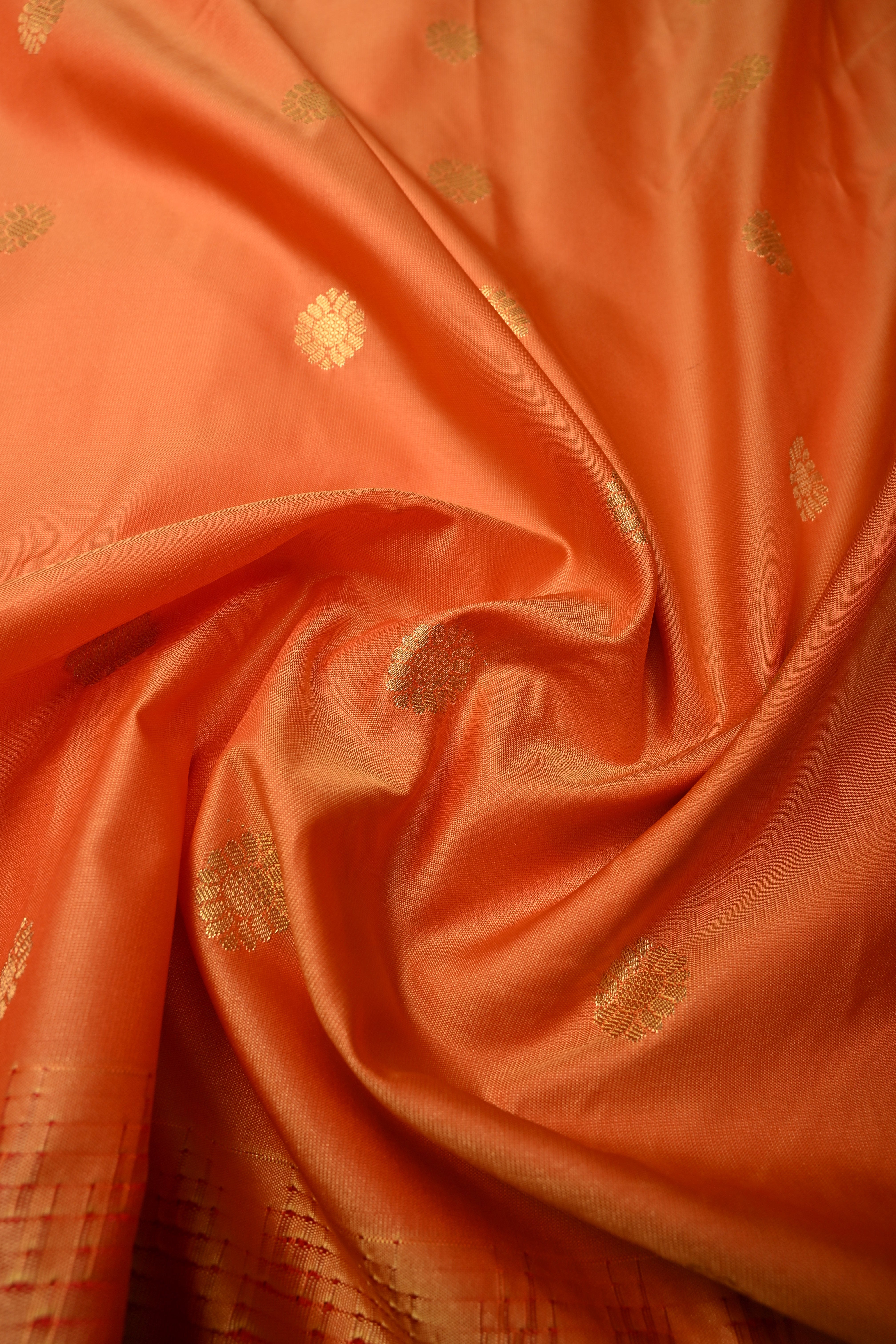 Orange Semi Gadwal Silk Saree with Floral Zari Buttas and Contrast Zari Border | Shobitam