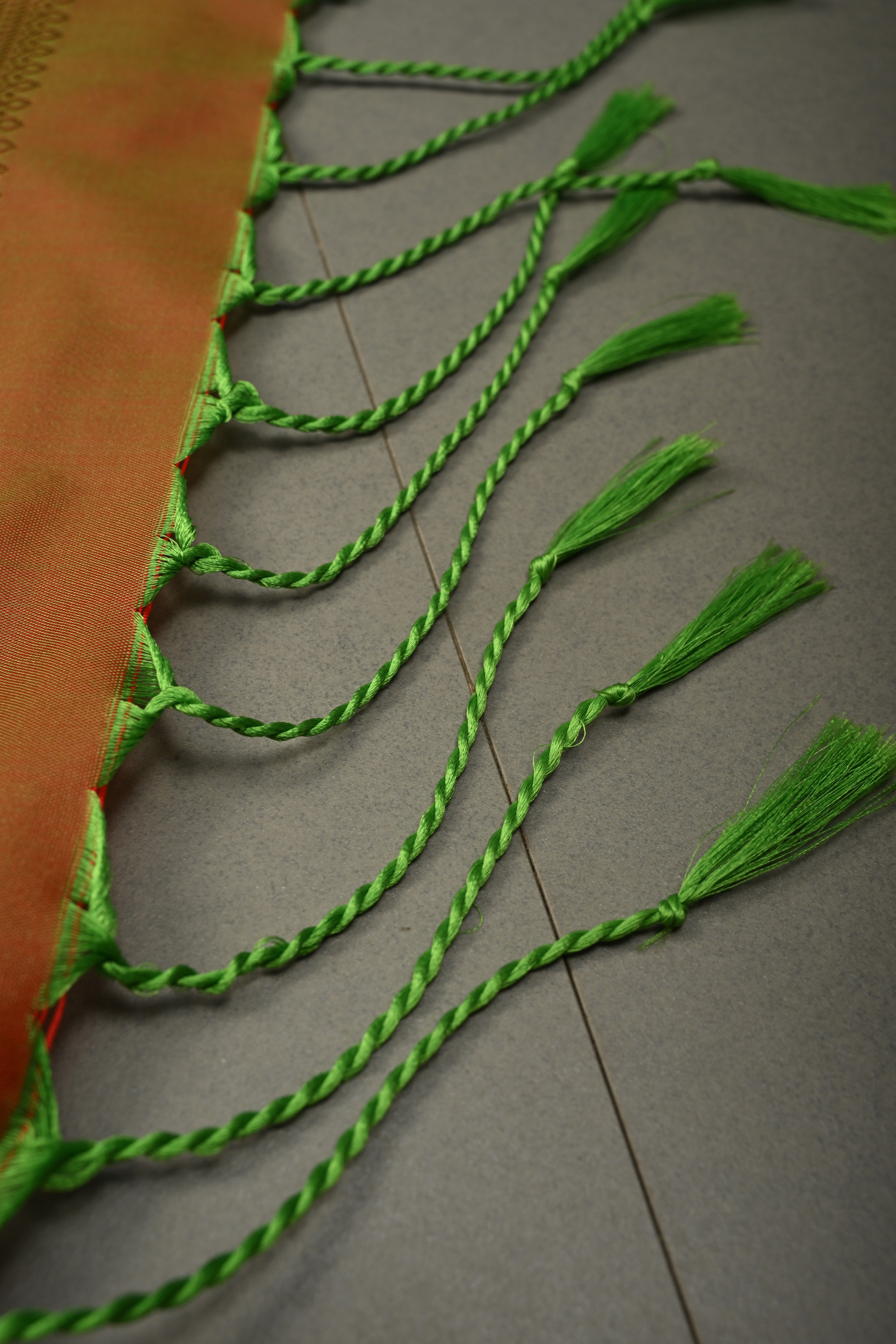 Green Kanchi Semi Silk Saree with Floral Zari Buttas and Gold-Silver Motifs on Border | Shobitam