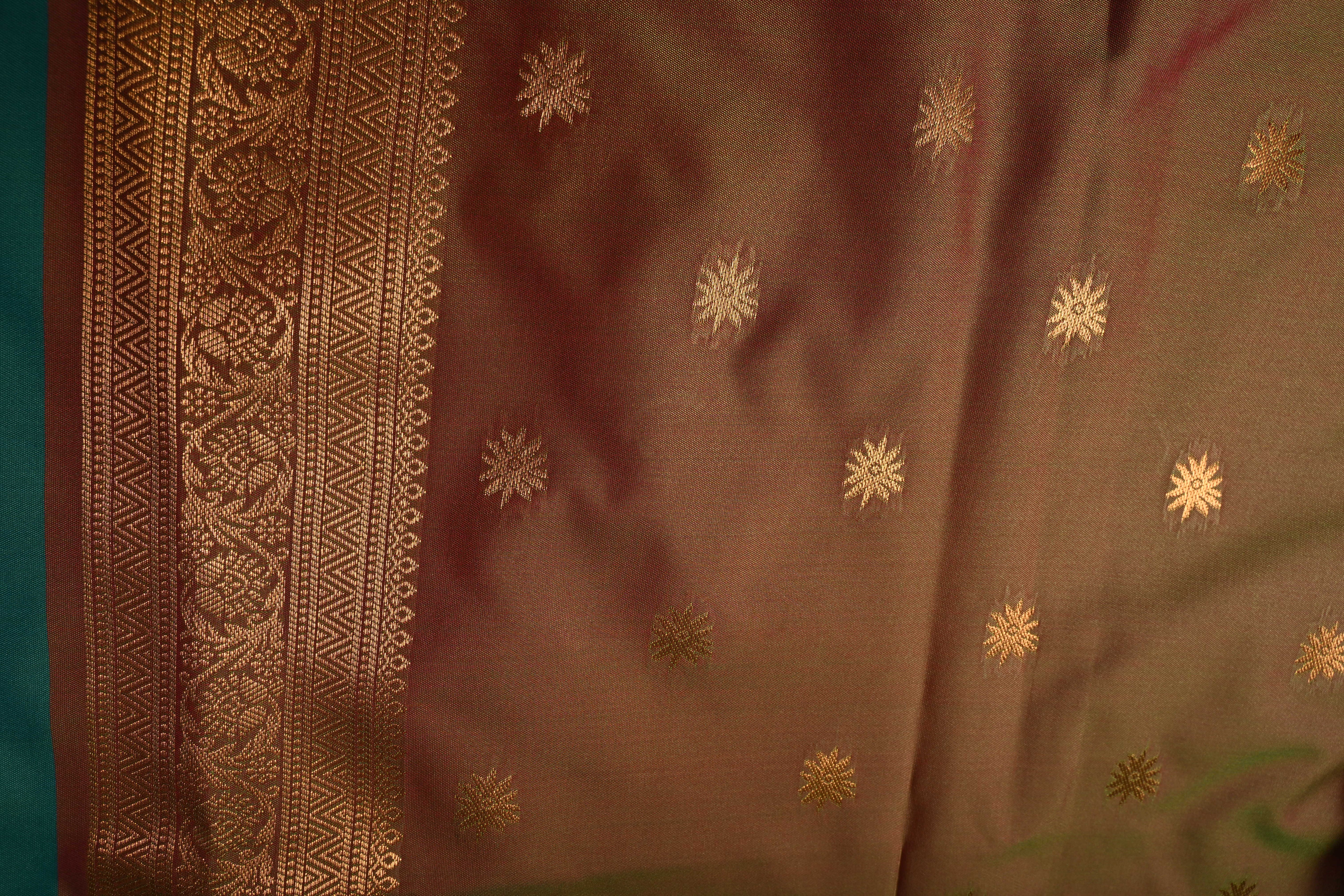 Green Dual tone Kanchi Semi Silk Saree with Floral Zari Buttas and Gold-Silver Motifs on Border | Shobitam