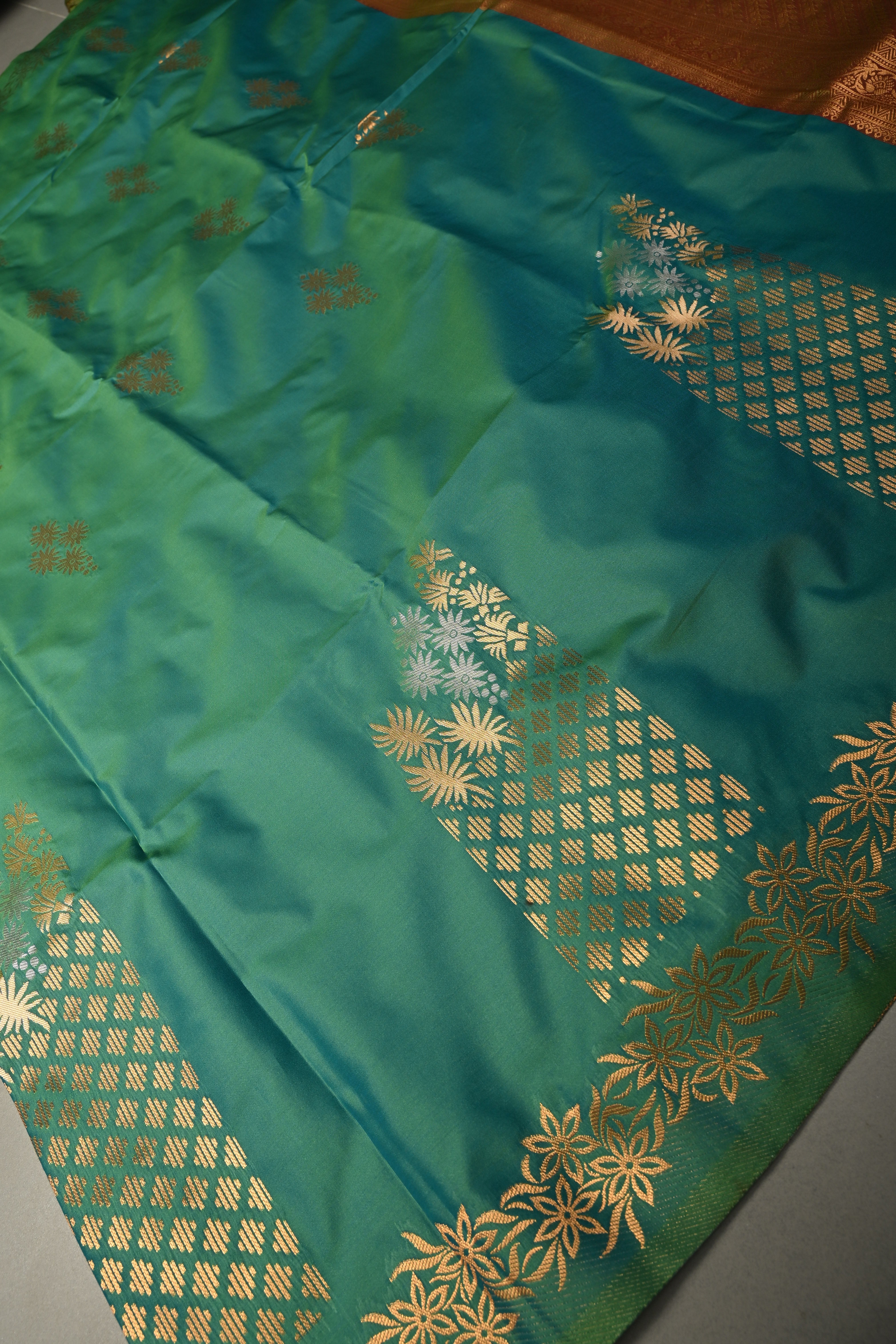Green Dual tone Kanchi Semi Silk Saree with Floral Zari Buttas and Gold-Silver Motifs on Border | Shobitam