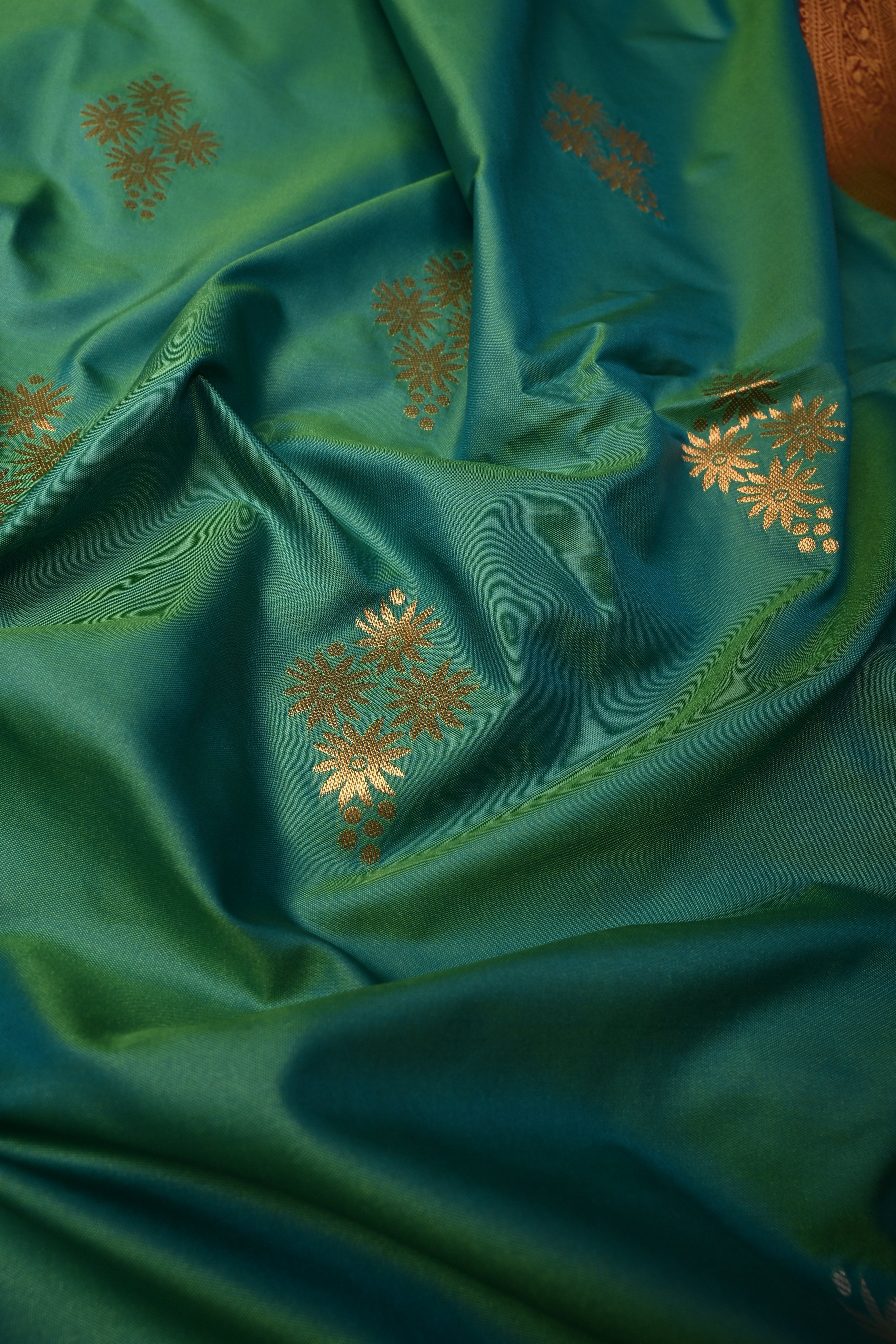 Green Dual tone Kanchi Semi Silk Saree with Floral Zari Buttas and Gold-Silver Motifs on Border | Shobitam