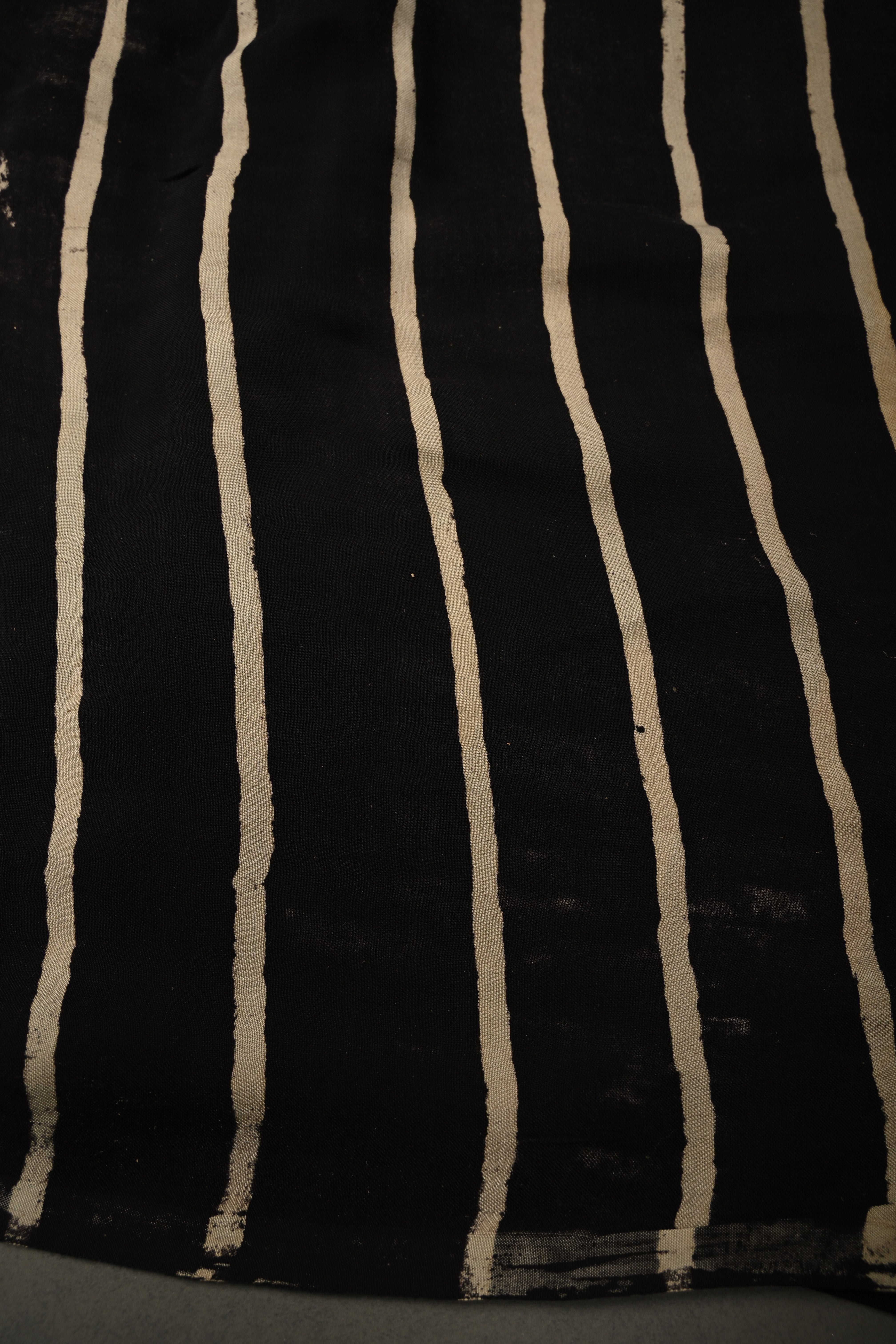 Black-White Borderless Modal Silk Saree with Stripes Hand Block Print and Checks Pattern Pallu | Shobitam