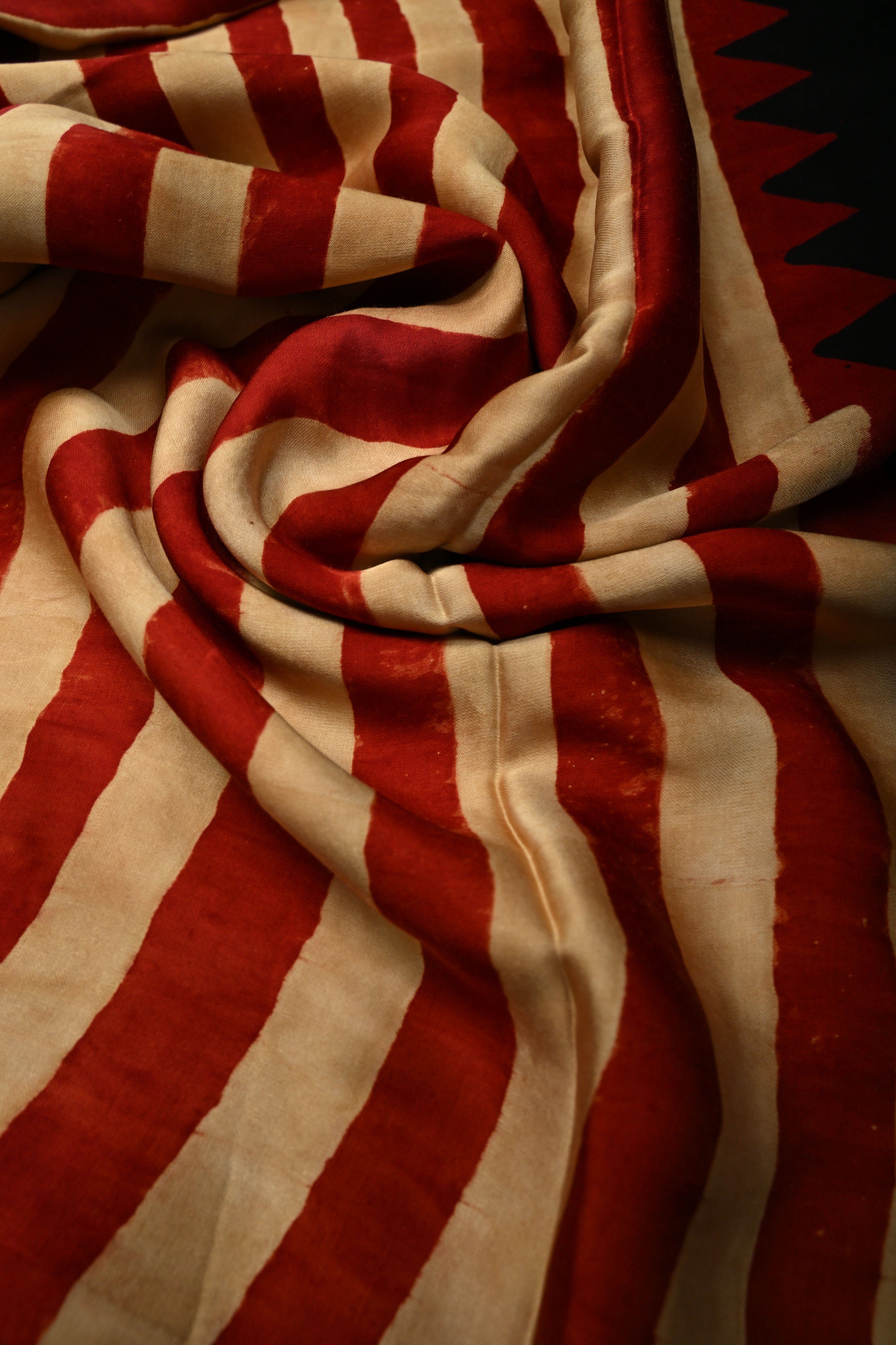 Beige-Red Borderless Modal Silk Saree with Stripes Hand Block Print and Contrast Black Checks Pattern Pallu | Shobitam