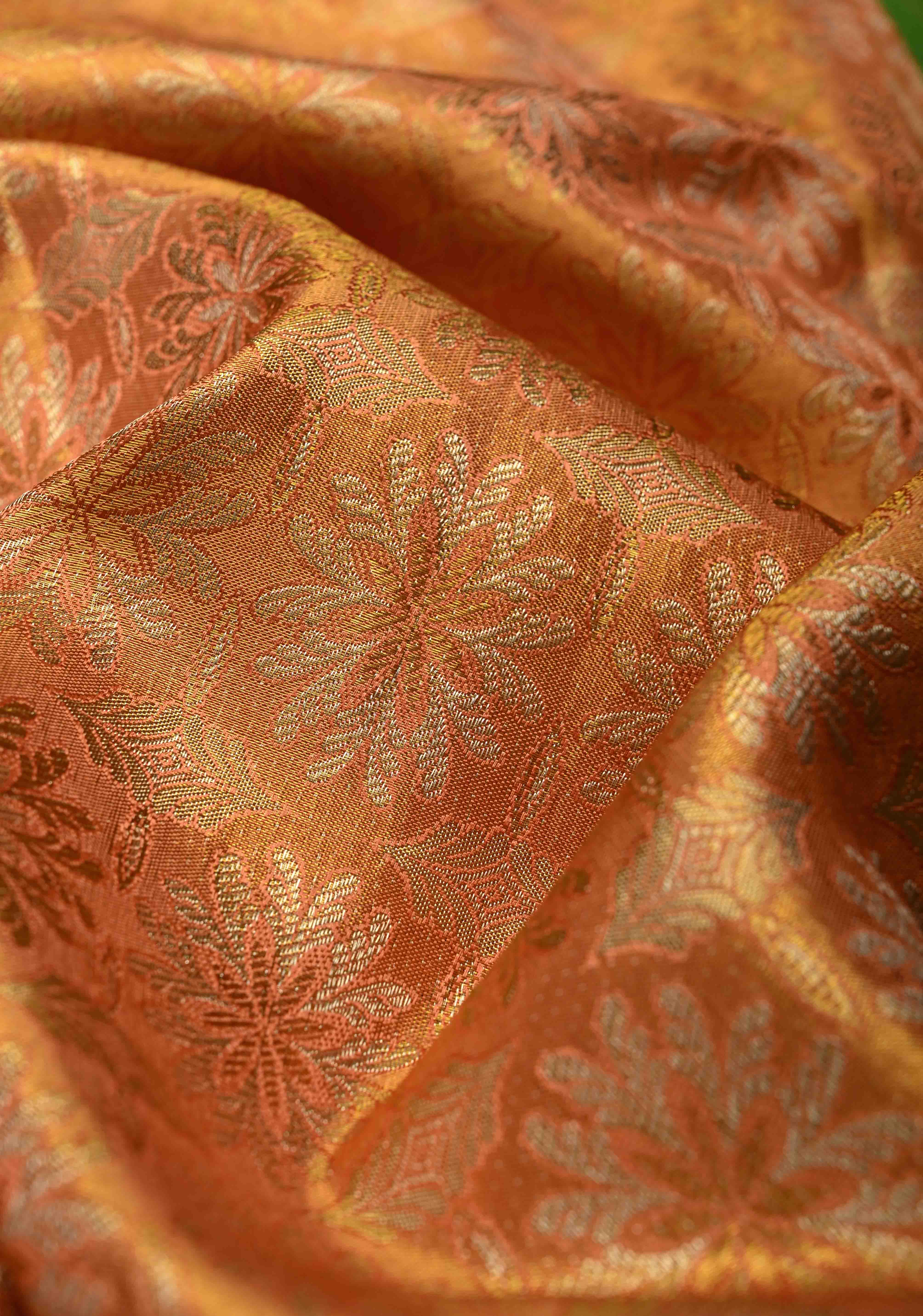 Peach Kanjivaram Tissue Semi Silk Saree with Meenakari Floral Brocade Jaal and Contrast Zari Border | Shobitam