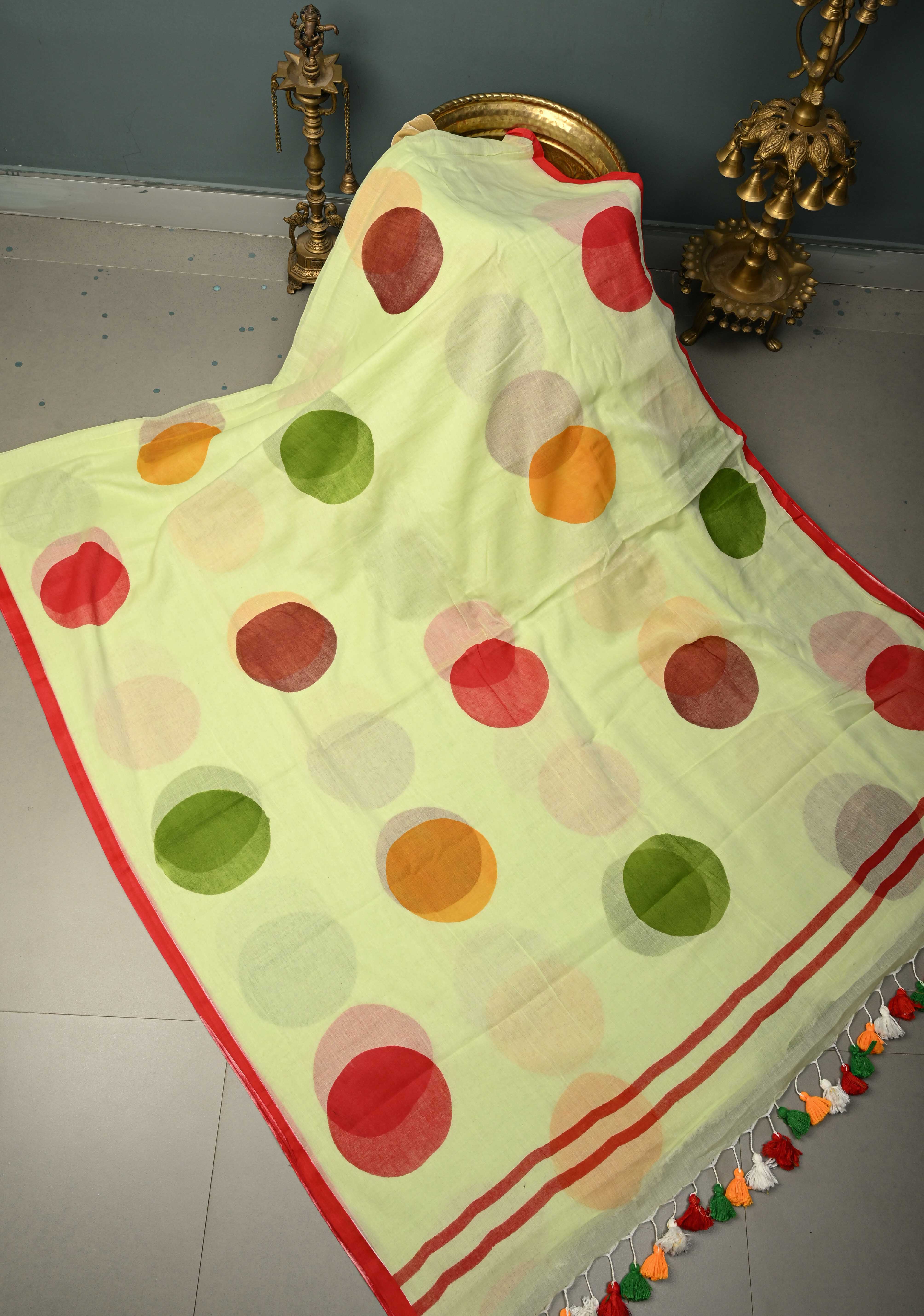 Tea Green Mulmul Cotton Saree with Hand Painted Circle Buttas and Multihue Tassels, No Blouse Piece |Shobitam