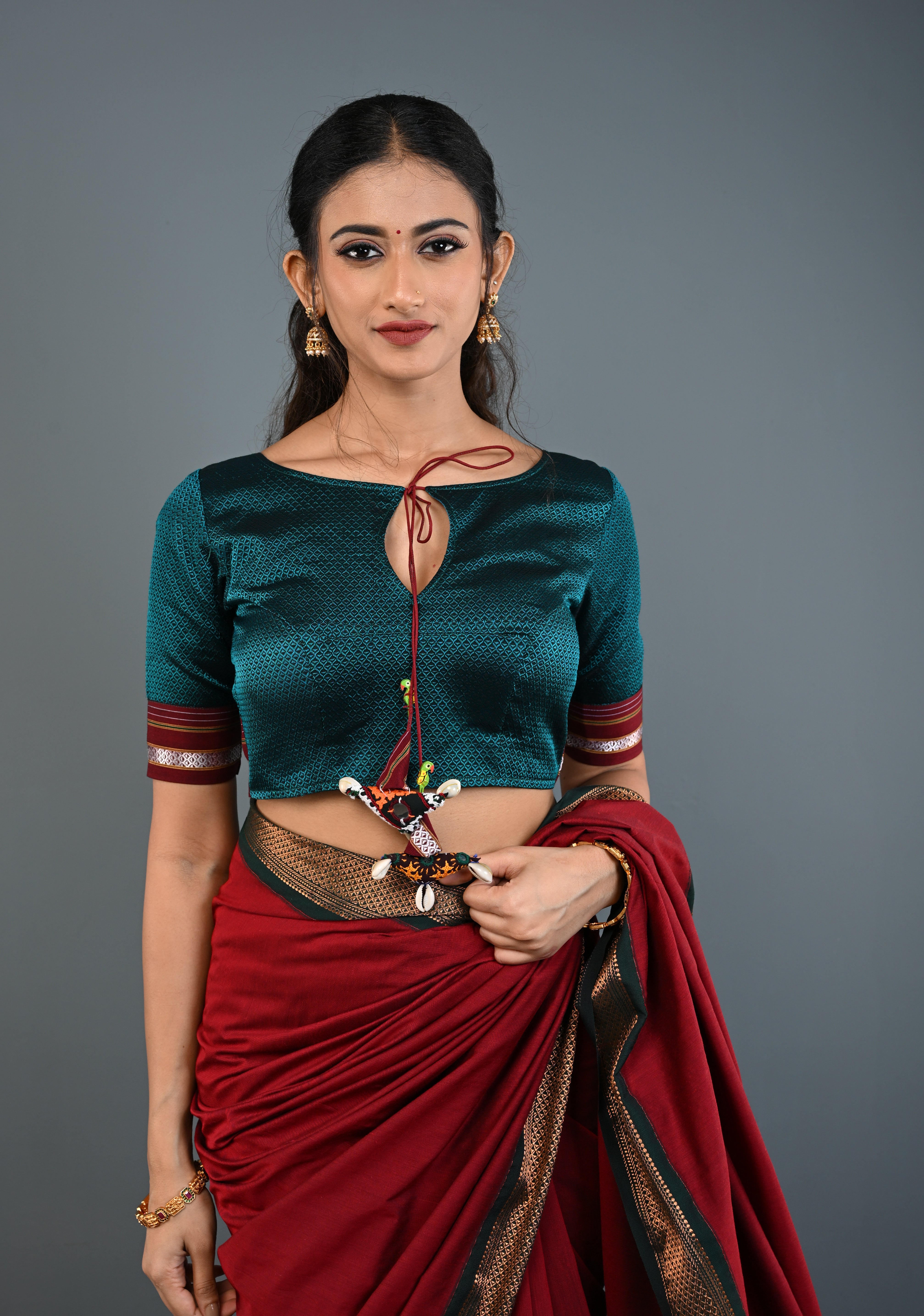 Teal-Black Khana Silk Blouse with Keyhole Neck and Cowrie Shells Tassels, Customizable, Made to Order | Shobitam