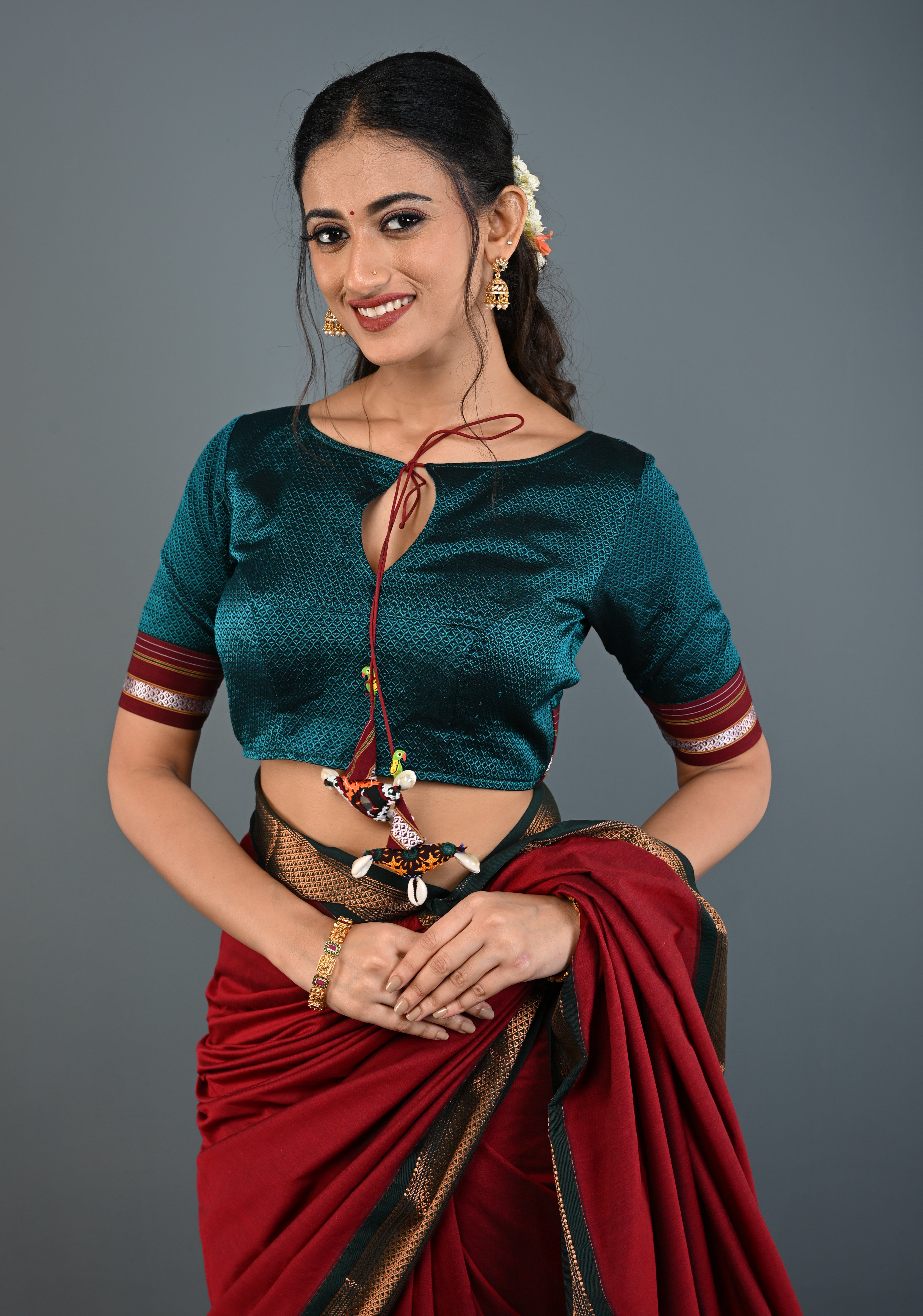 Teal-Black Khana Silk Blouse with Keyhole Neck and Cowrie Shells Tassels, Customizable, Made to Order | Shobitam