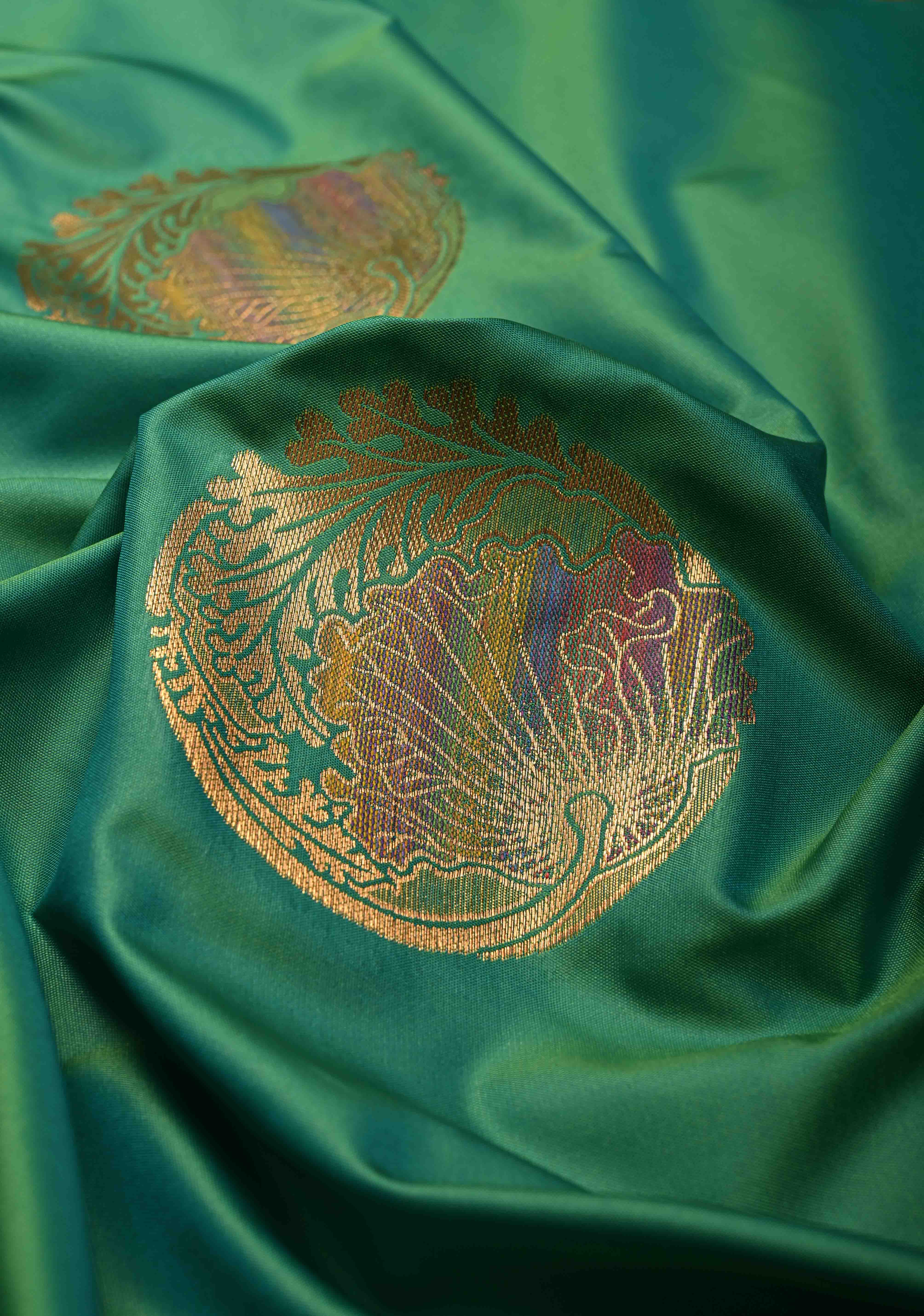 Green Kanchi Semi Silk Saree with Meenakari Mandala Buttas and Contrast Antique Zari Border | Shobitam