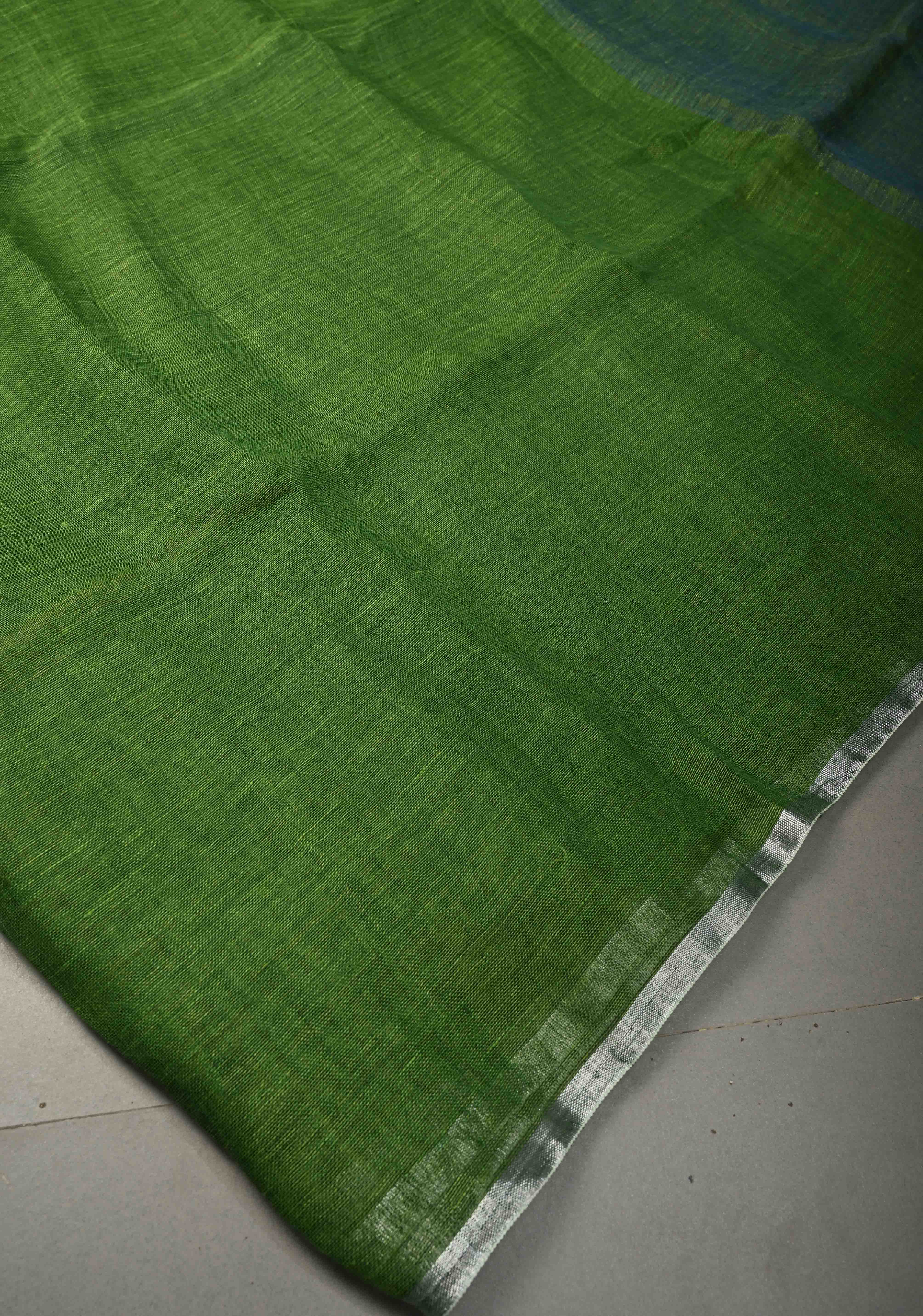 Grass Green Handloom Linen by Linen Saree with Minimal Tissue Border and Honeycomb Tassels | Shobitam