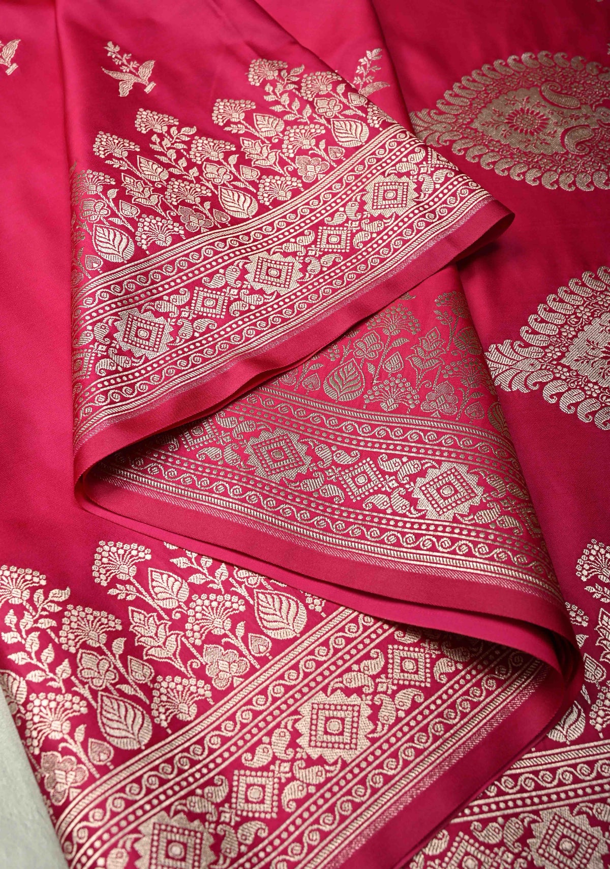 Rani Pink Banarasi Semi Mashru Silk Saree with Floral Silver Zari Buttas and Zari Border | SHOBITAM