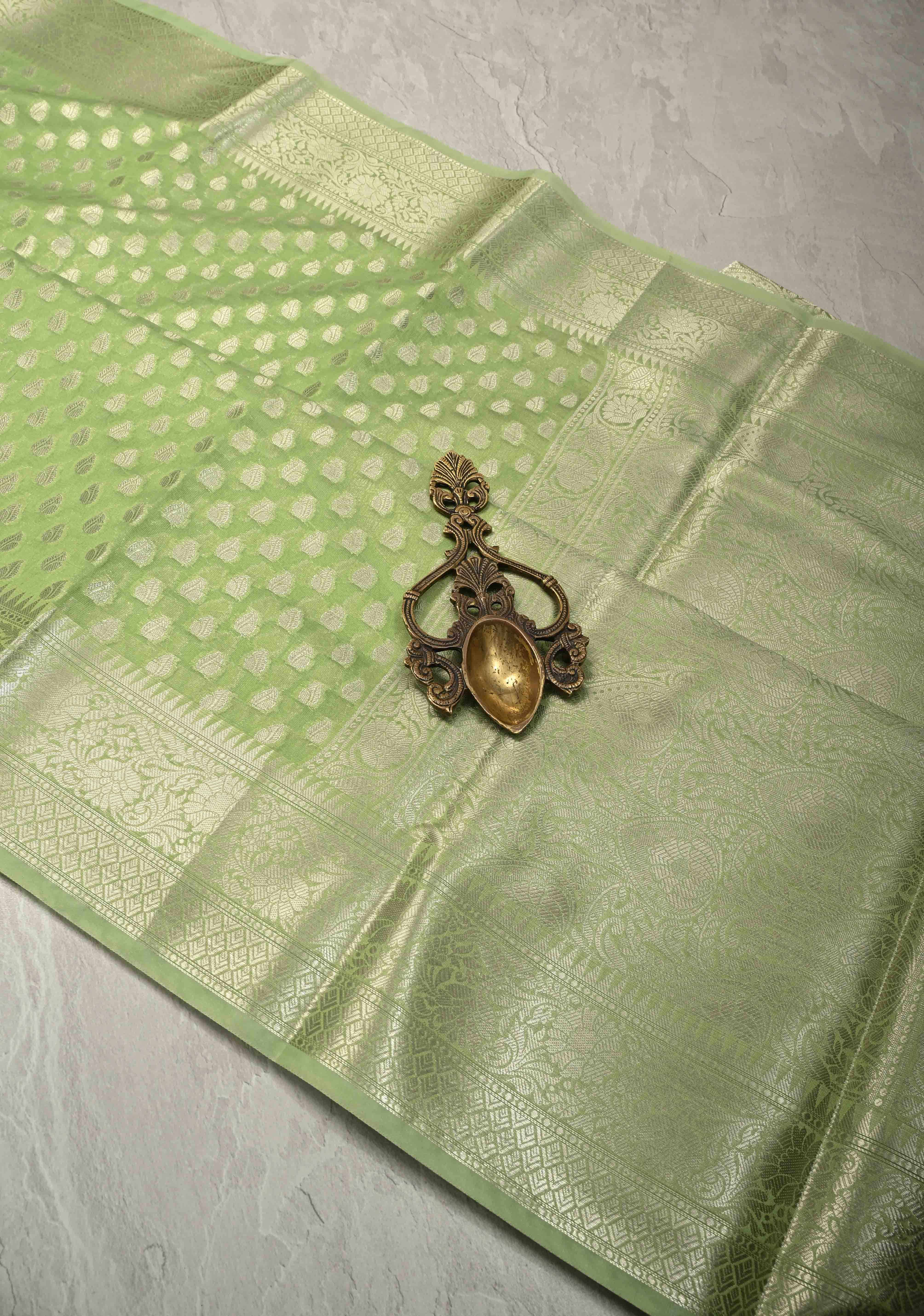 Pista Green Banarasi Semi Kora Saree with Silver Zari Buttas and Zari Border | Shobitam