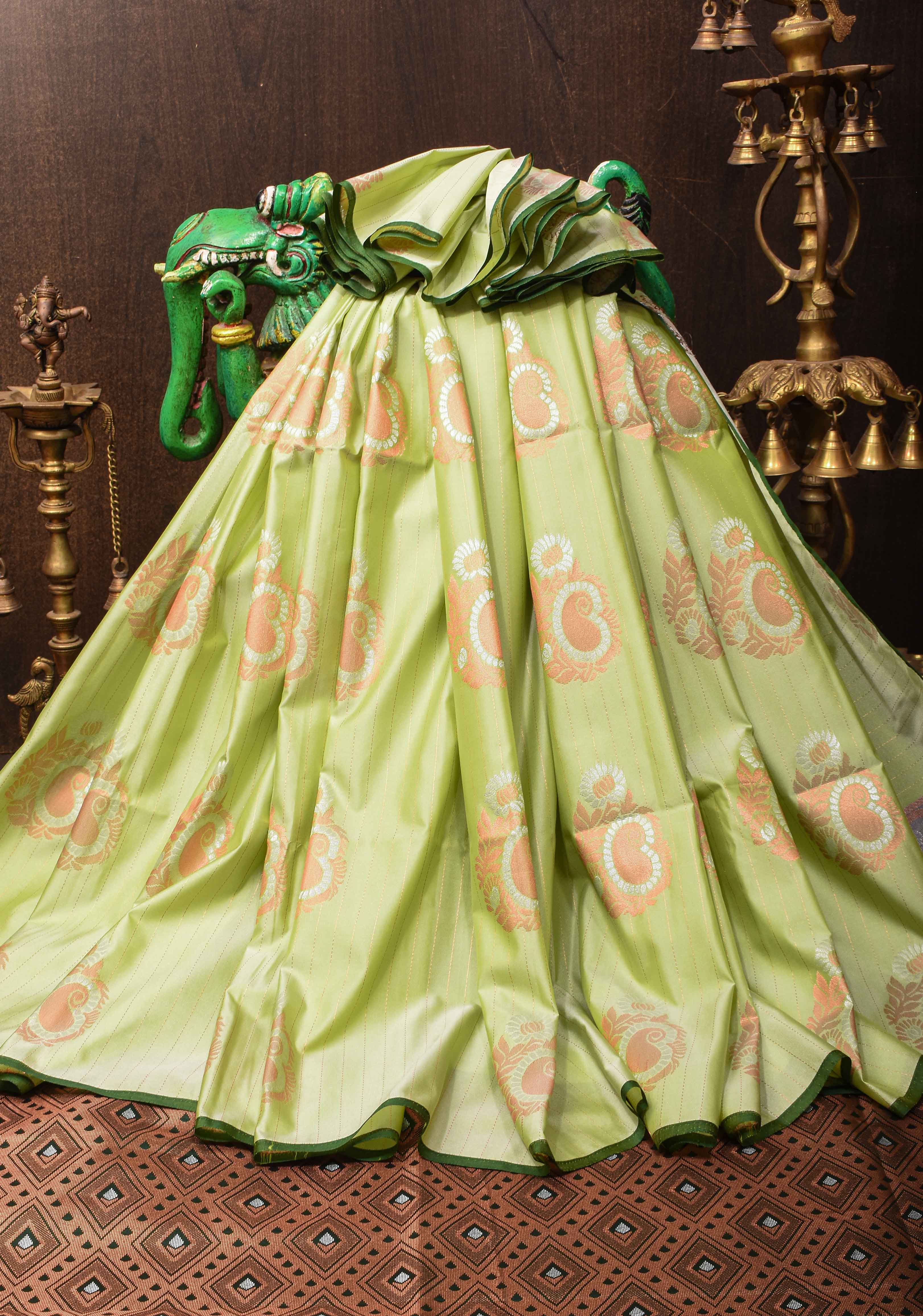 Tea Green Borderless Semi Silk Saree with Zari Stripes and Alfi Paisley Motifs | Shobitam