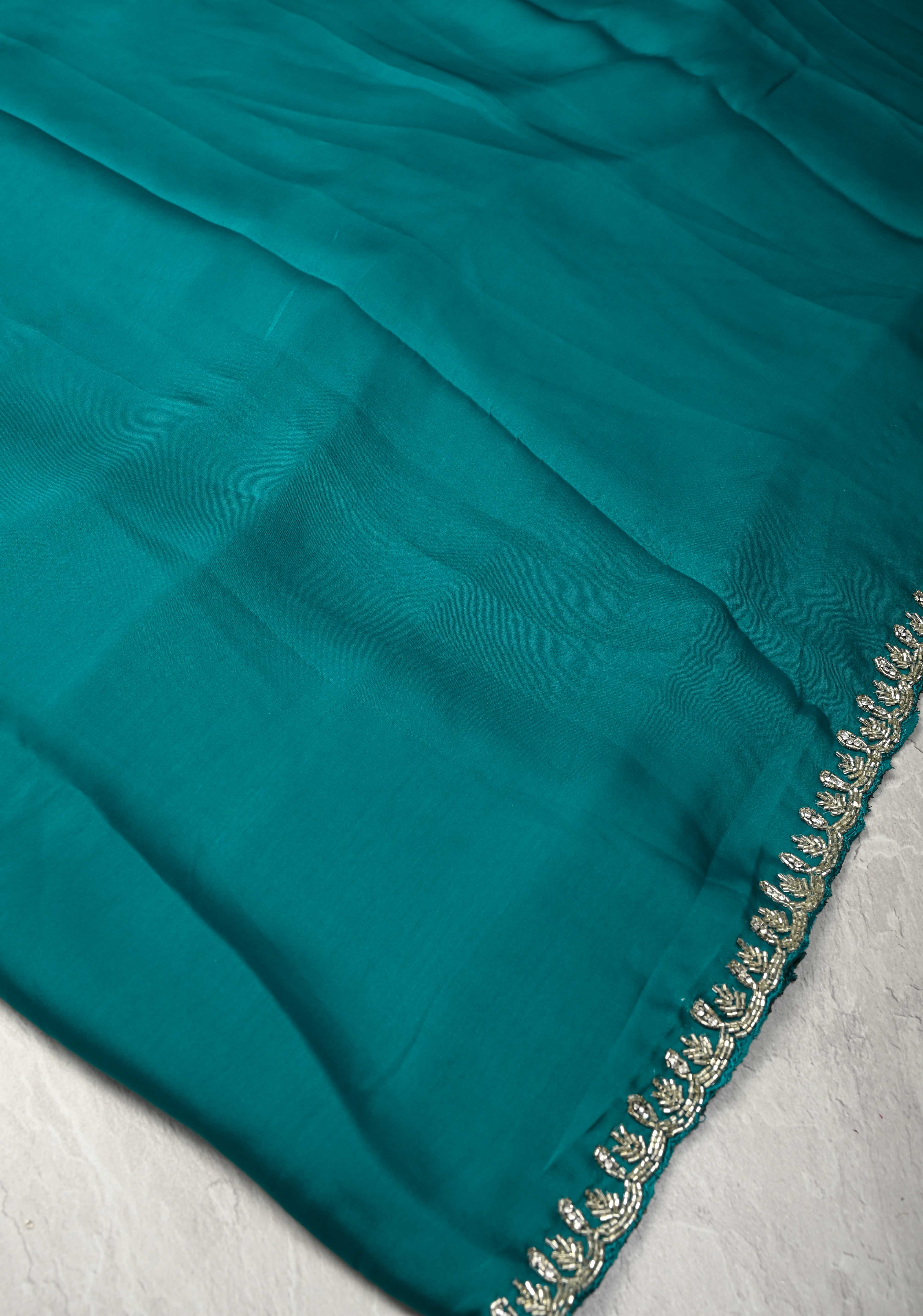 Teal Satin Geoergette Saree with minimal cutdana borders | Shobitam