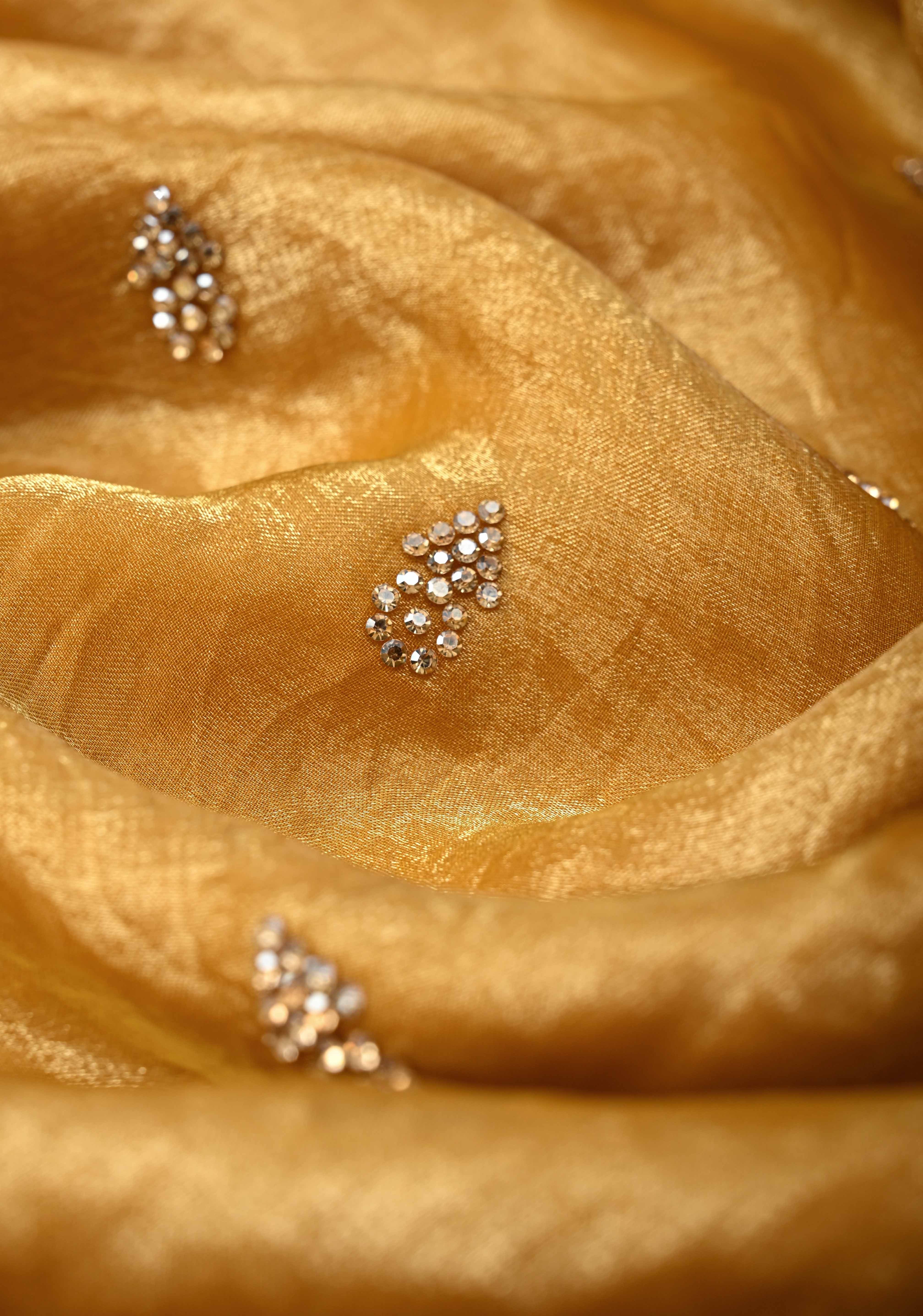 Mustard Yellow Shimmer Georgette Saree with Stone Embellishments and Minimal Border | Shobitam