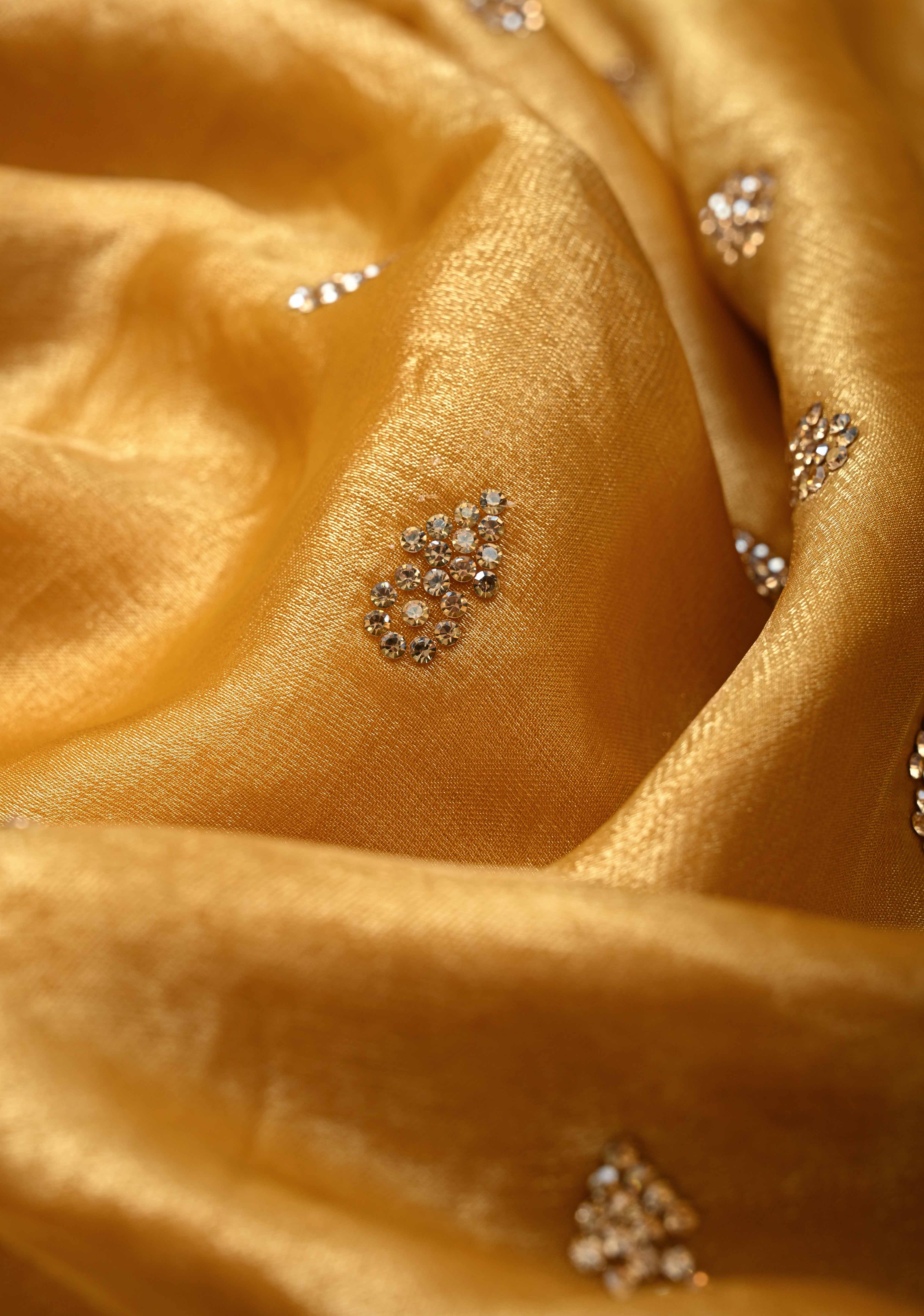 Mustard Yellow Shimmer Georgette Saree with Stone Embellishments and Minimal Border | Shobitam