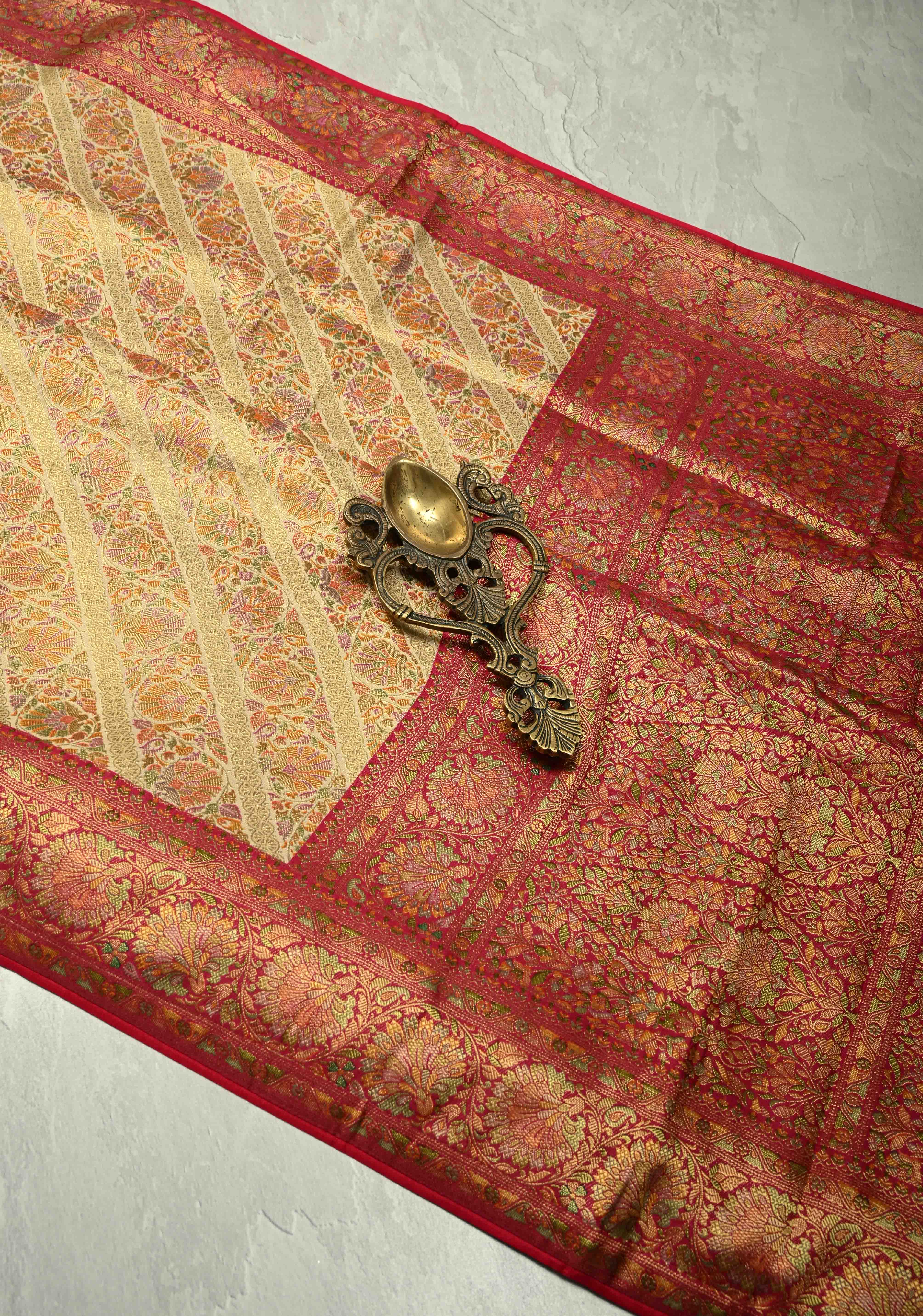 Vegan Silk Saree in Cream with Meenakari Floral Diagonal Stripes and Contrast Border | Shobitam