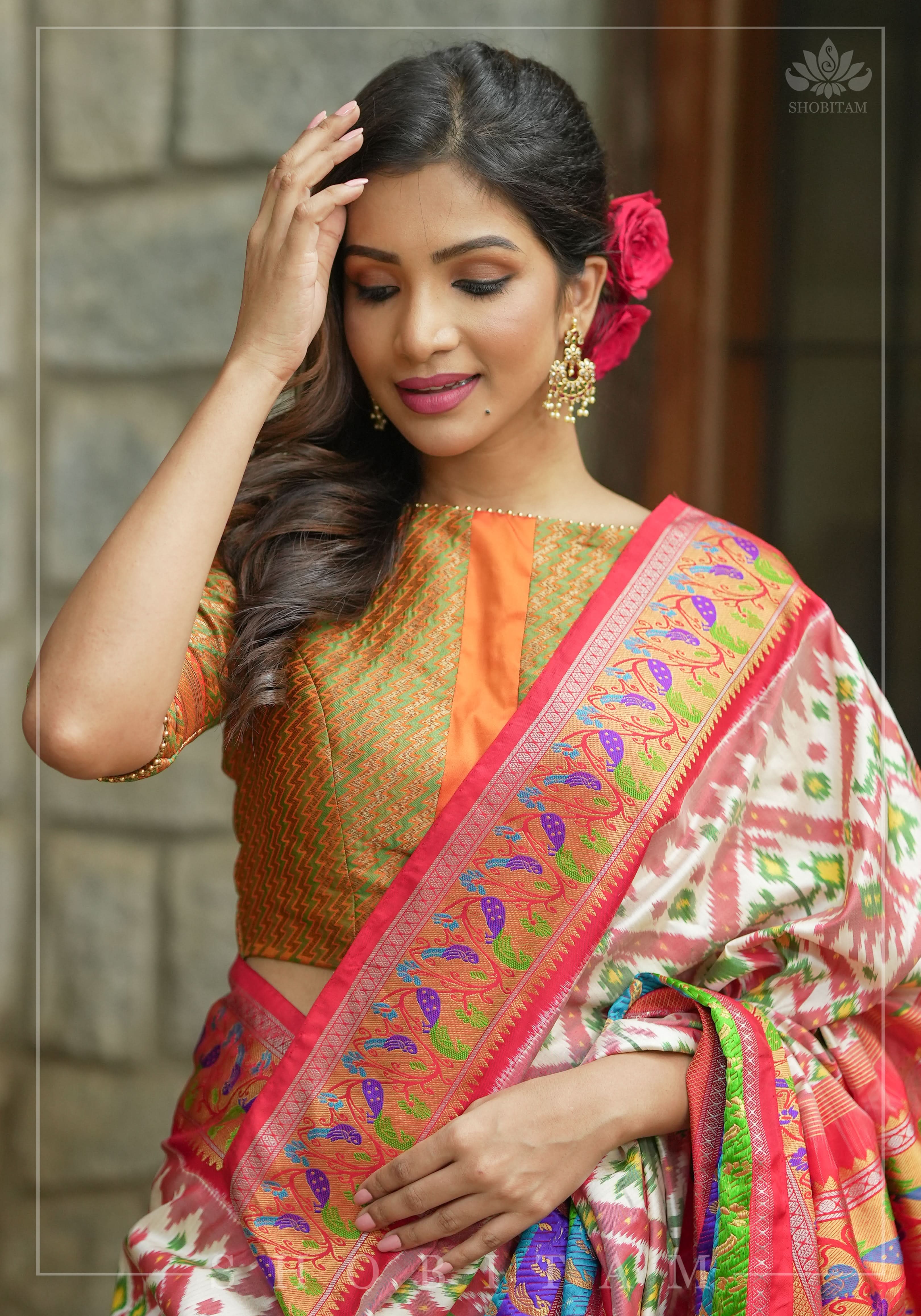 Henna Green and orange Jacquard boatneck blouse with plain silk detailing, Made to Order | Shobitam