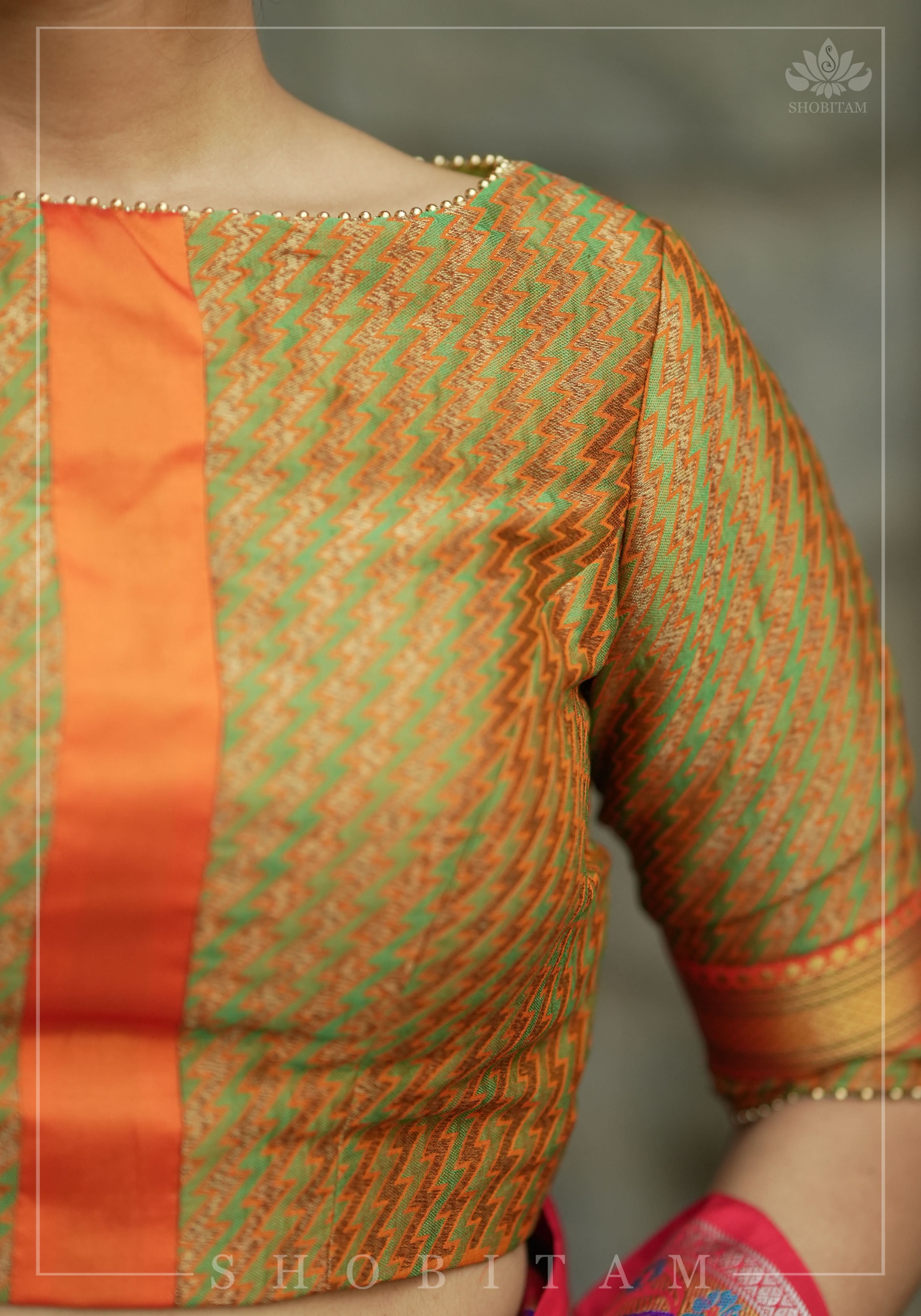 Henna Green and orange Jacquard boatneck blouse with plain silk detailing, Made to Order | Shobitam