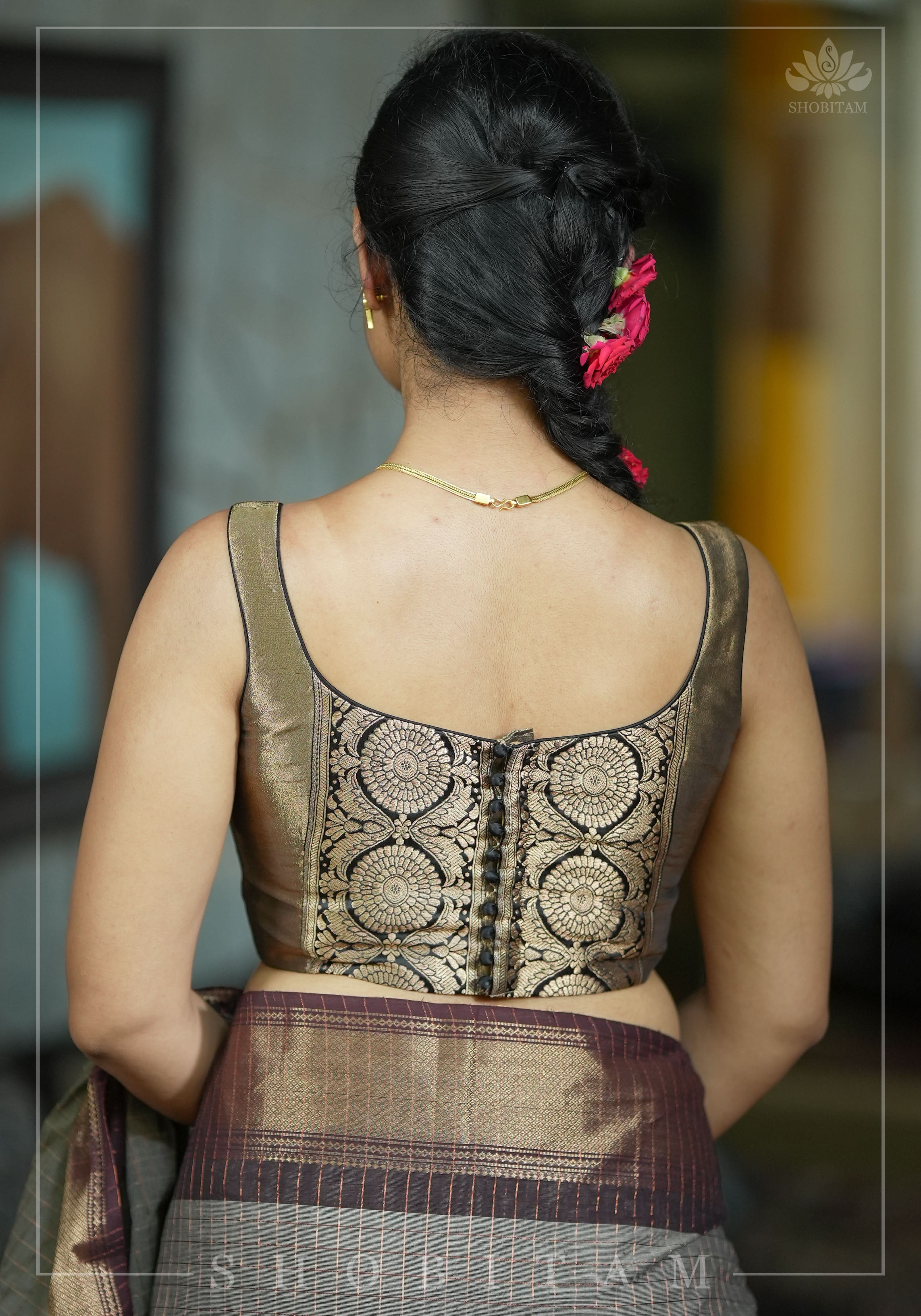 Bronze tissue brocade U neck sleeveless blouse with black brocade detailing | Shobitam