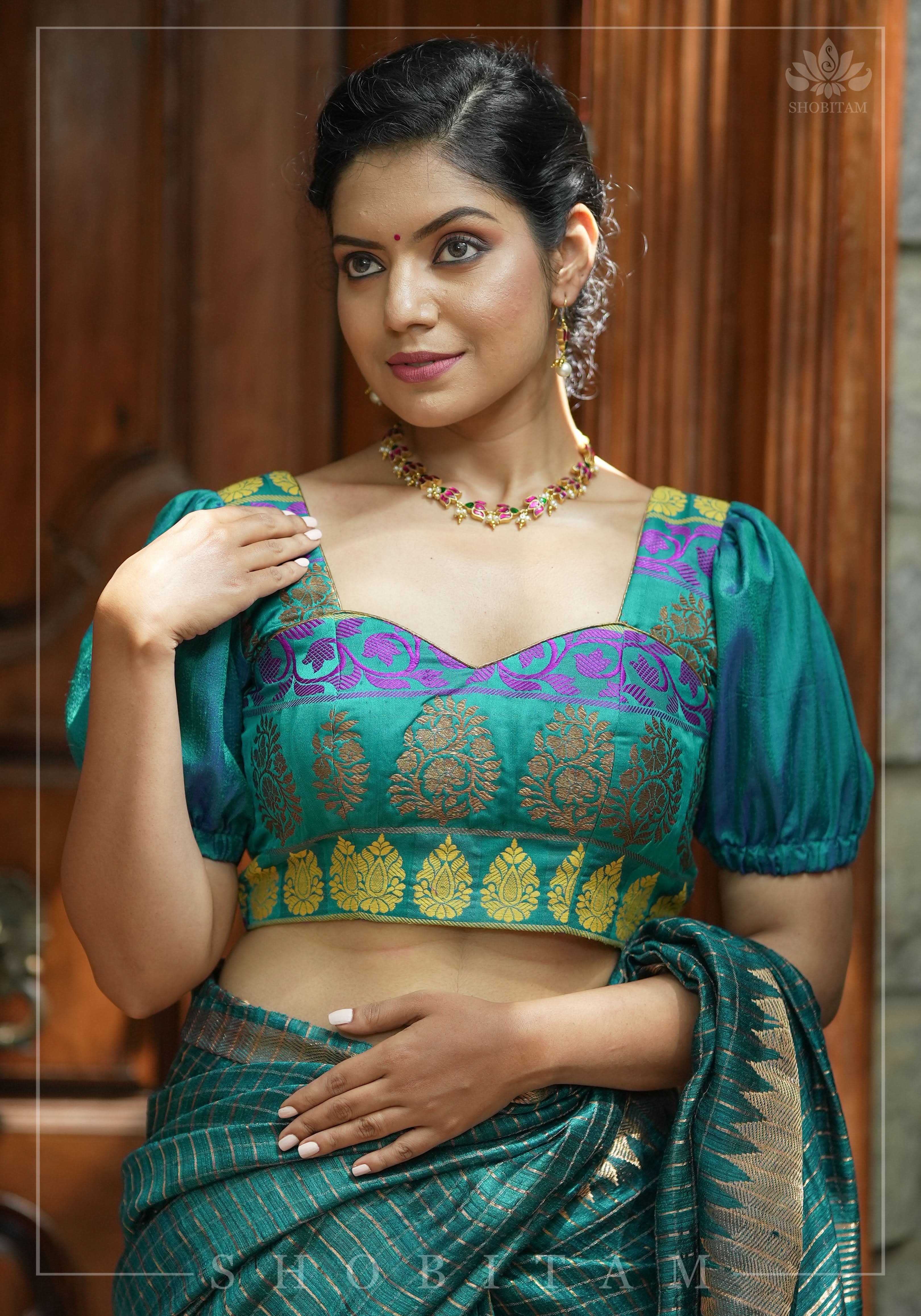 Teal brocade & pure rawsilk sweet heart neck blouse with sleeve detailing, Made to Order | Shobitam