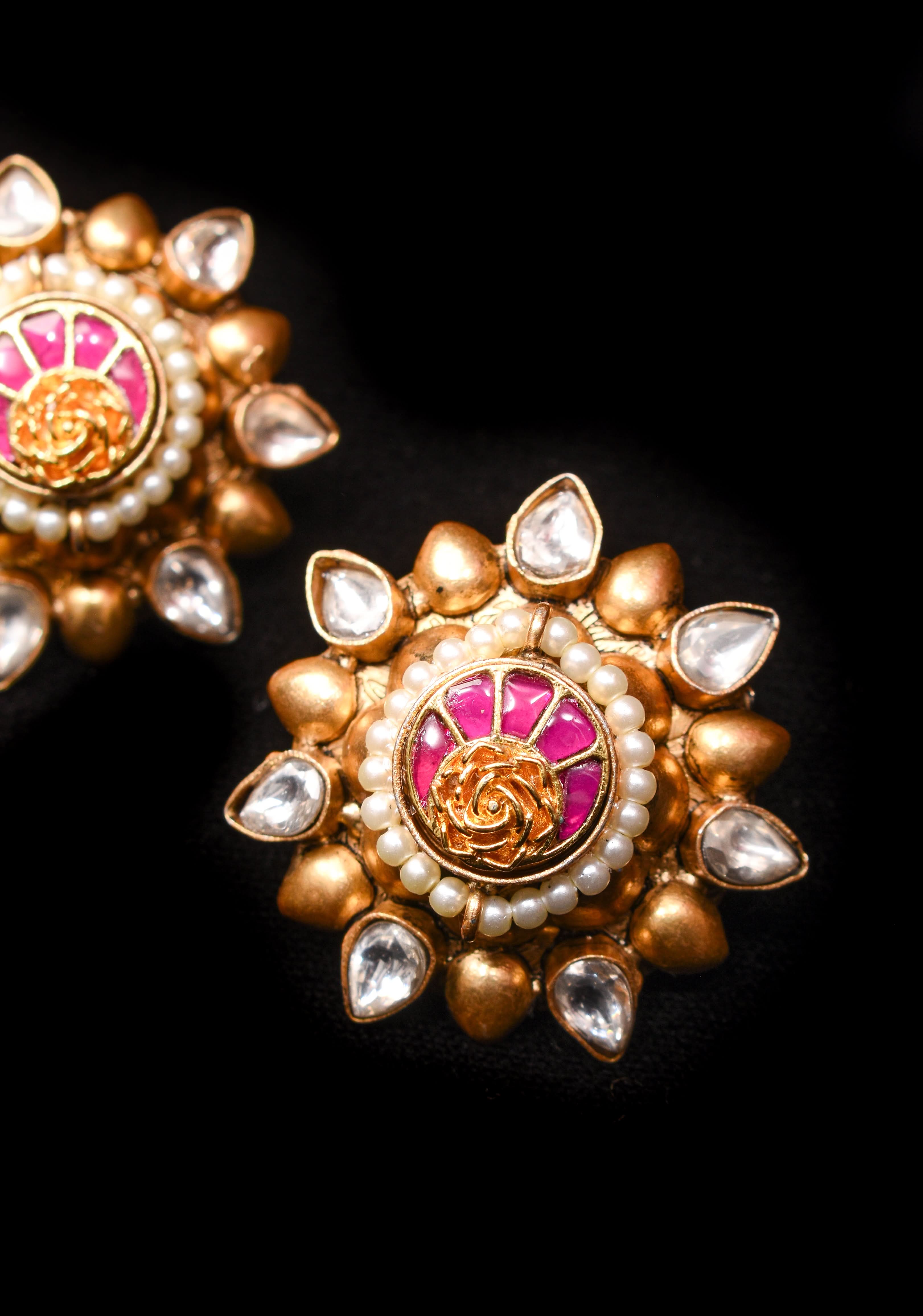 Gold statement studs with Pink Kundan embellishments, lightweight jewelry | Shobitam Jewelry