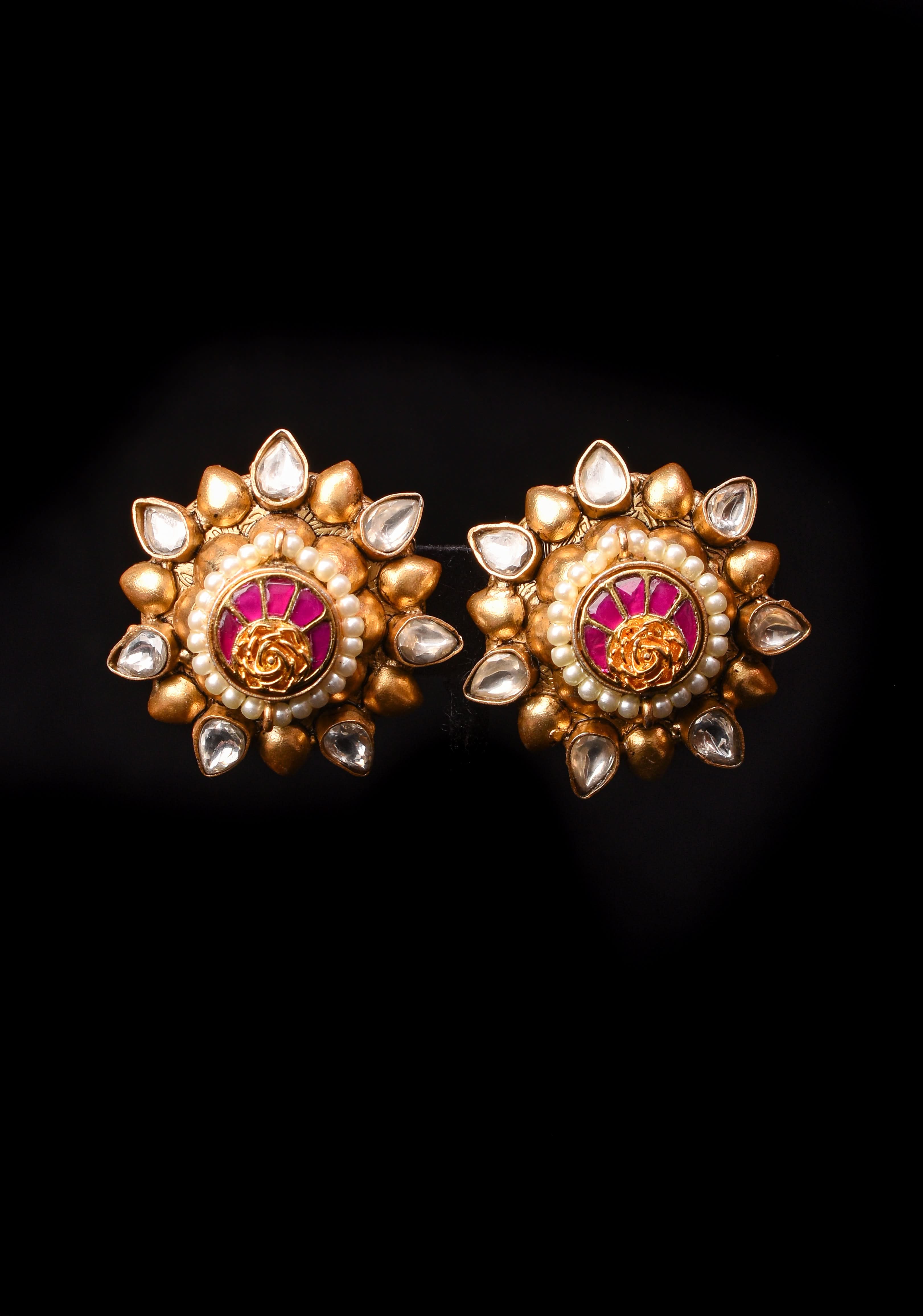 Gold statement studs with Pink Kundan embellishments, lightweight jewelry | Shobitam Jewelry