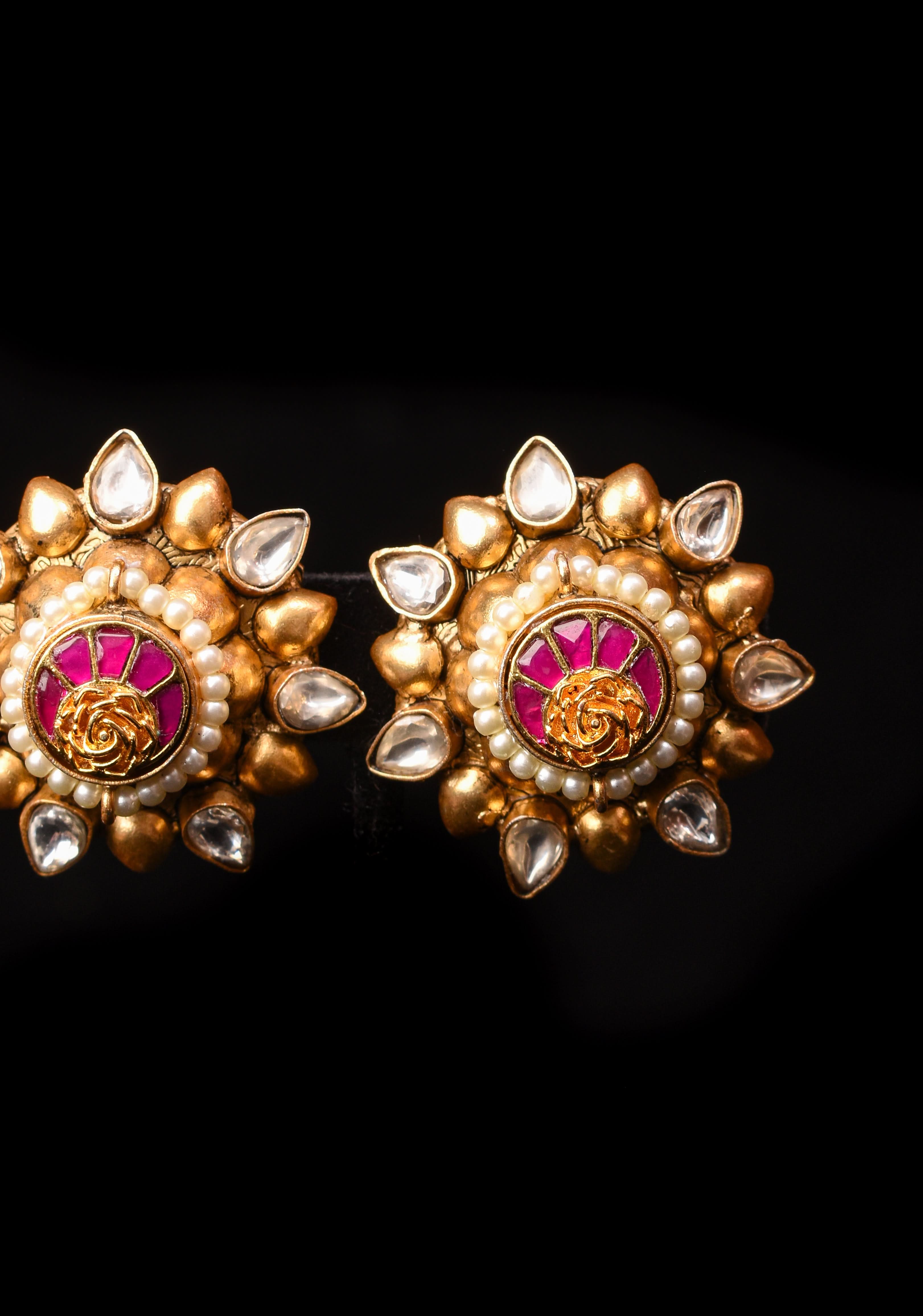 Gold statement studs with Pink Kundan embellishments, lightweight jewelry | Shobitam Jewelry