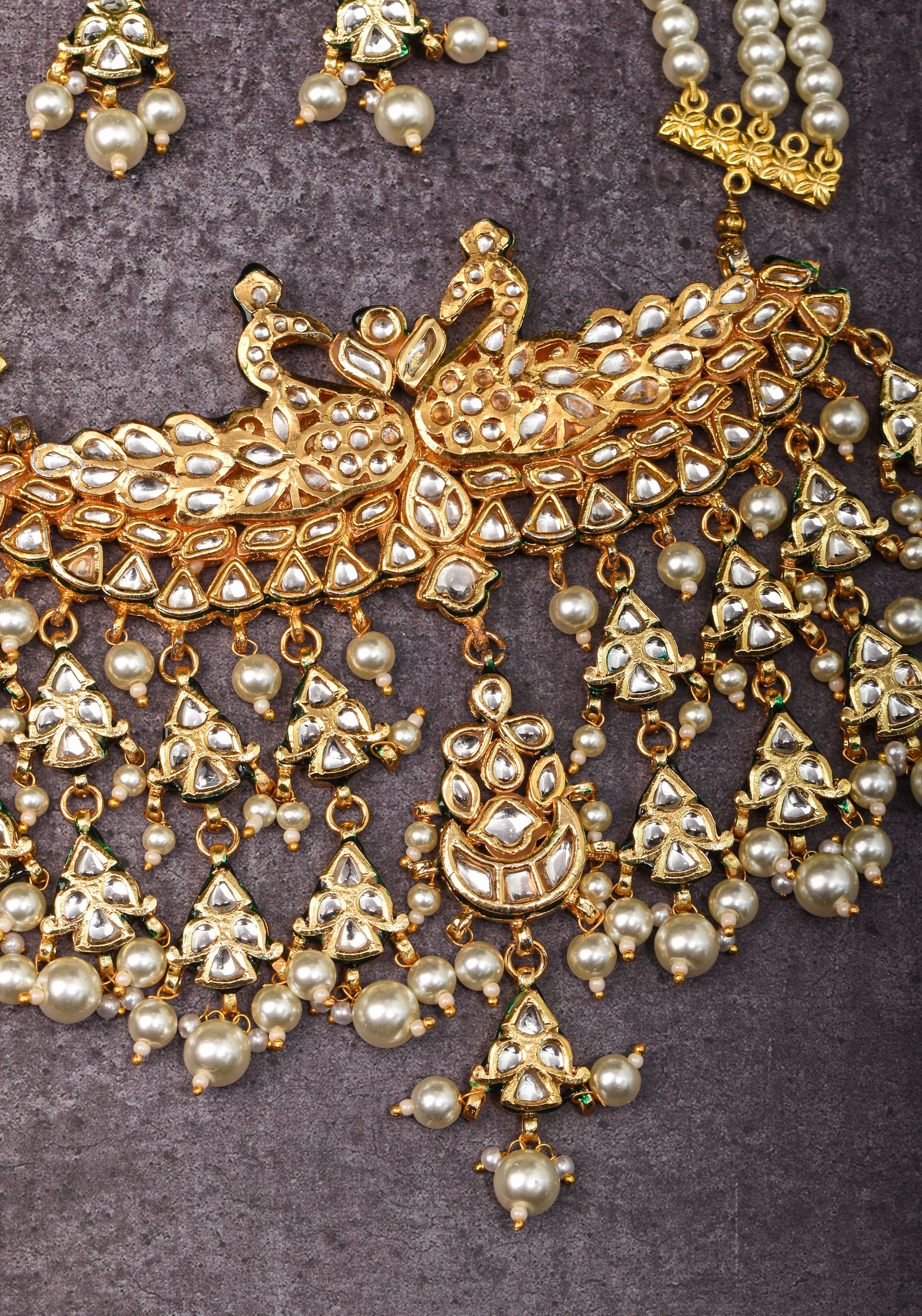 Statement Twin Peacock White Kundan Necklace Set with three rows of beads and 4.2" Long Earrings | SHOBITAM