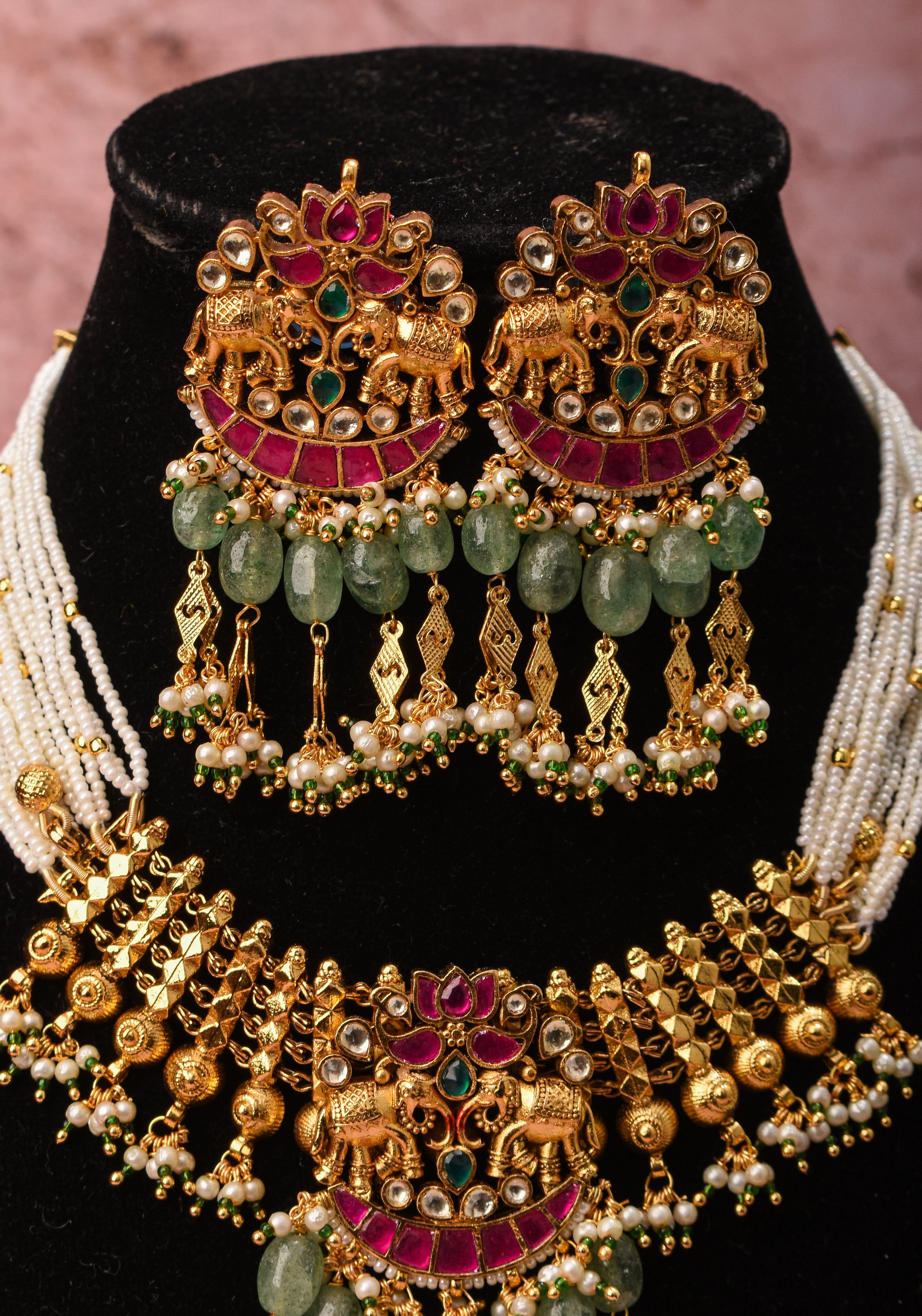 Antique Gold Tone White beads Multistrand Gold Tone Flexible Twin elephant design Simple Necklace Set with sage green dangling beads | SHOBITAM