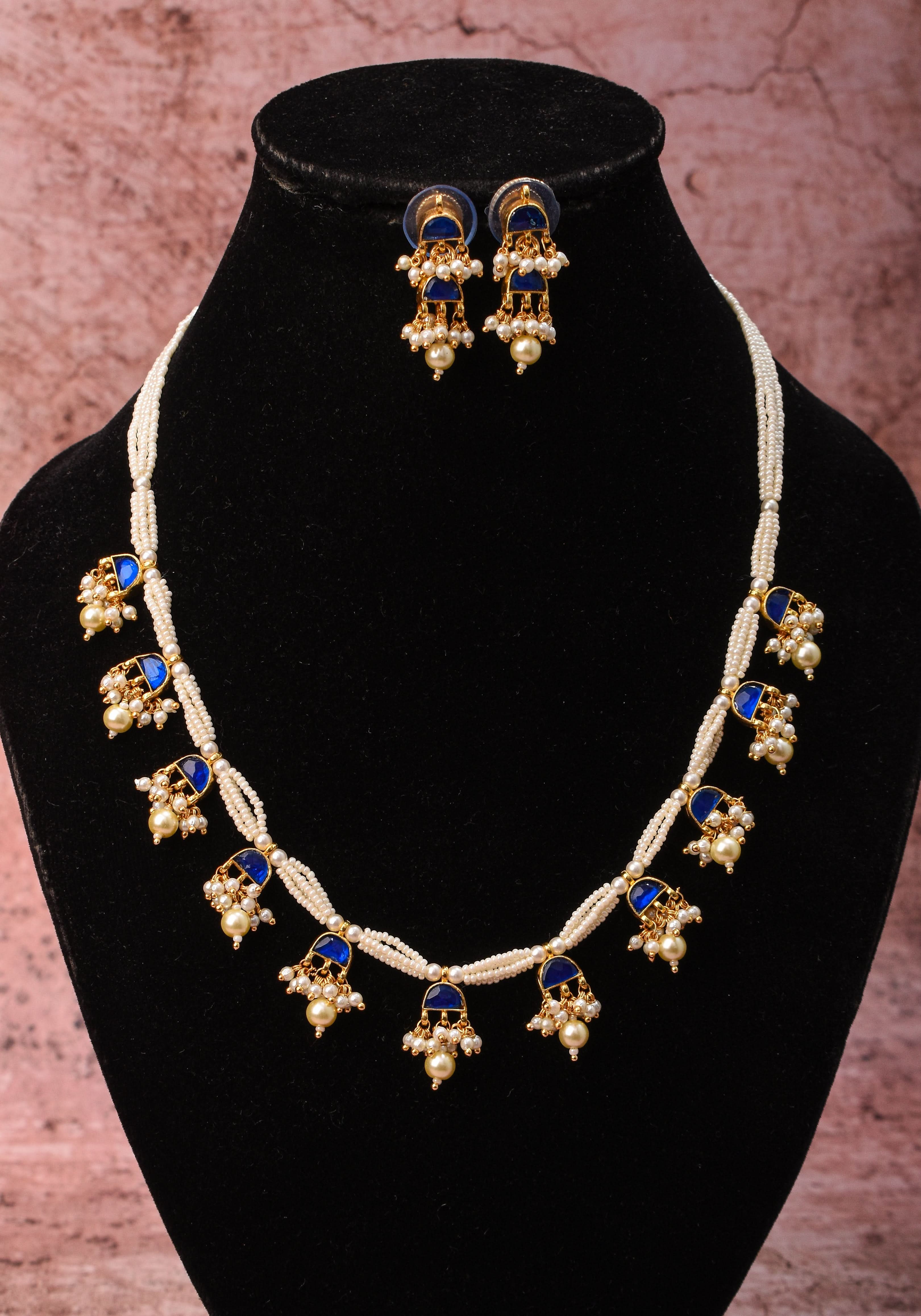 Lightweight Jadau Necklace Set with eleven dangling royal blue stones and matching earrings | Shobitam Jewelry