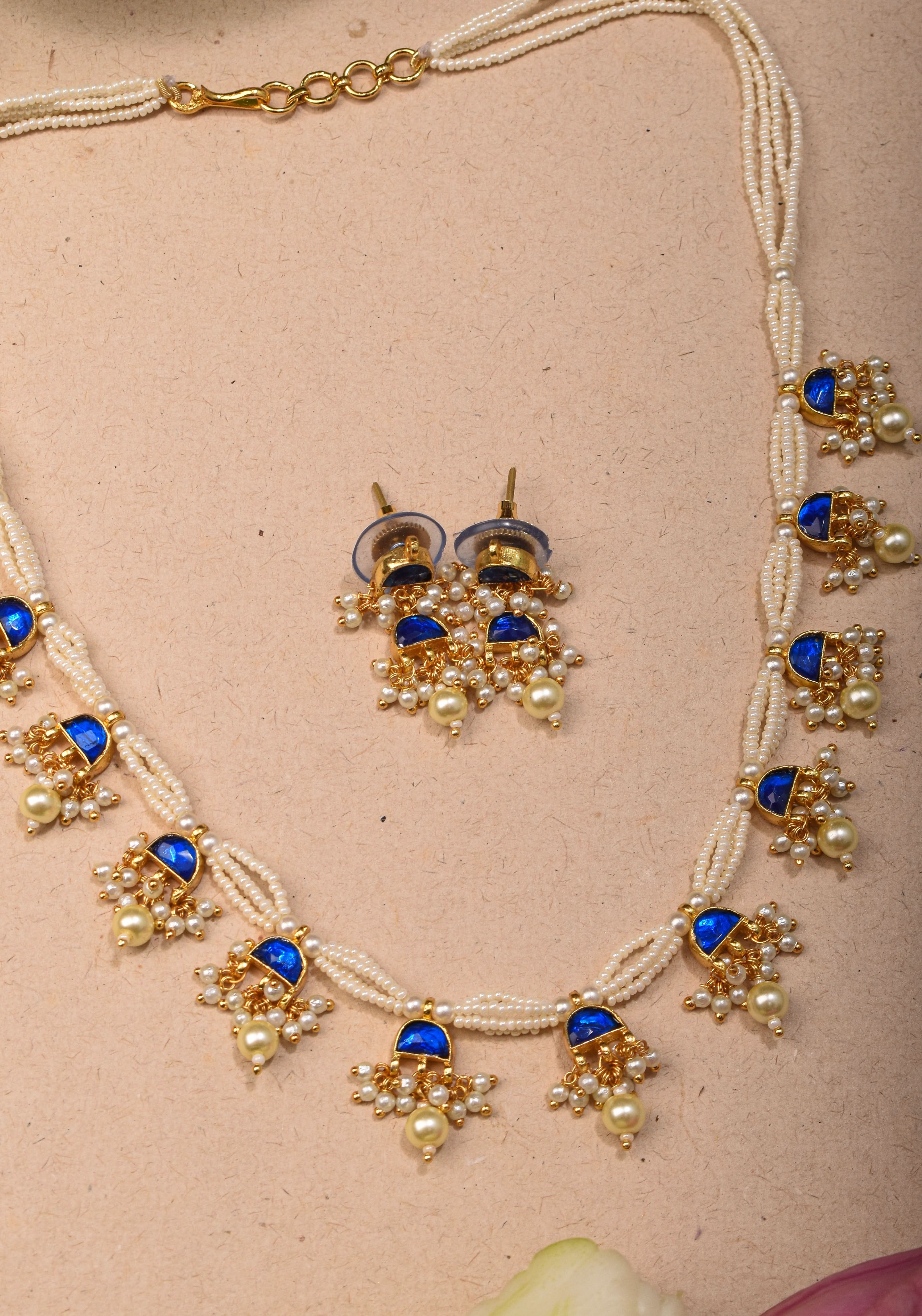 Lightweight Jadau Necklace Set with eleven dangling royal blue stones and matching earrings | Shobitam Jewelry