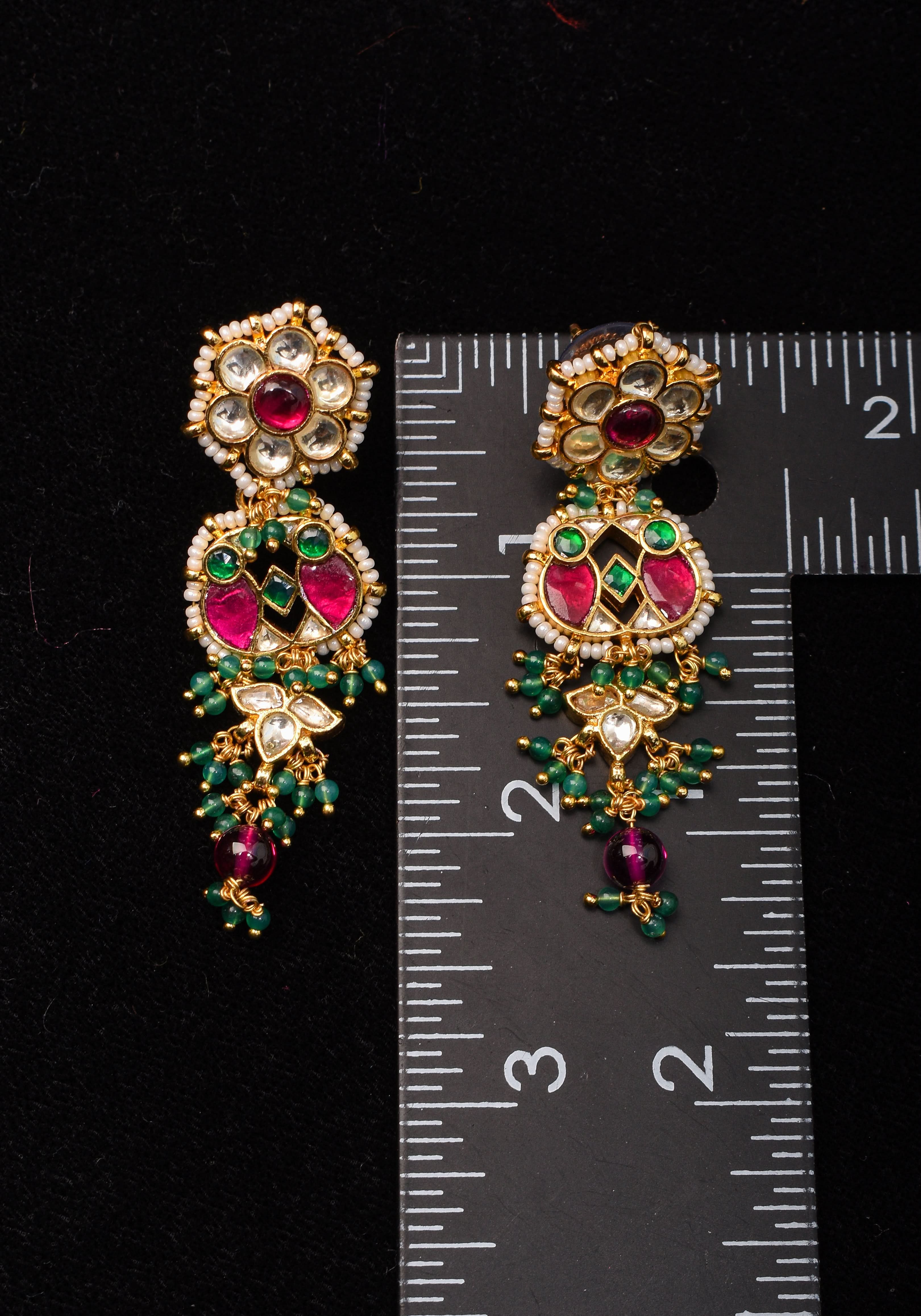 Earrings with flower embedded in Jadau technique and dangling beads | SHOBITAM