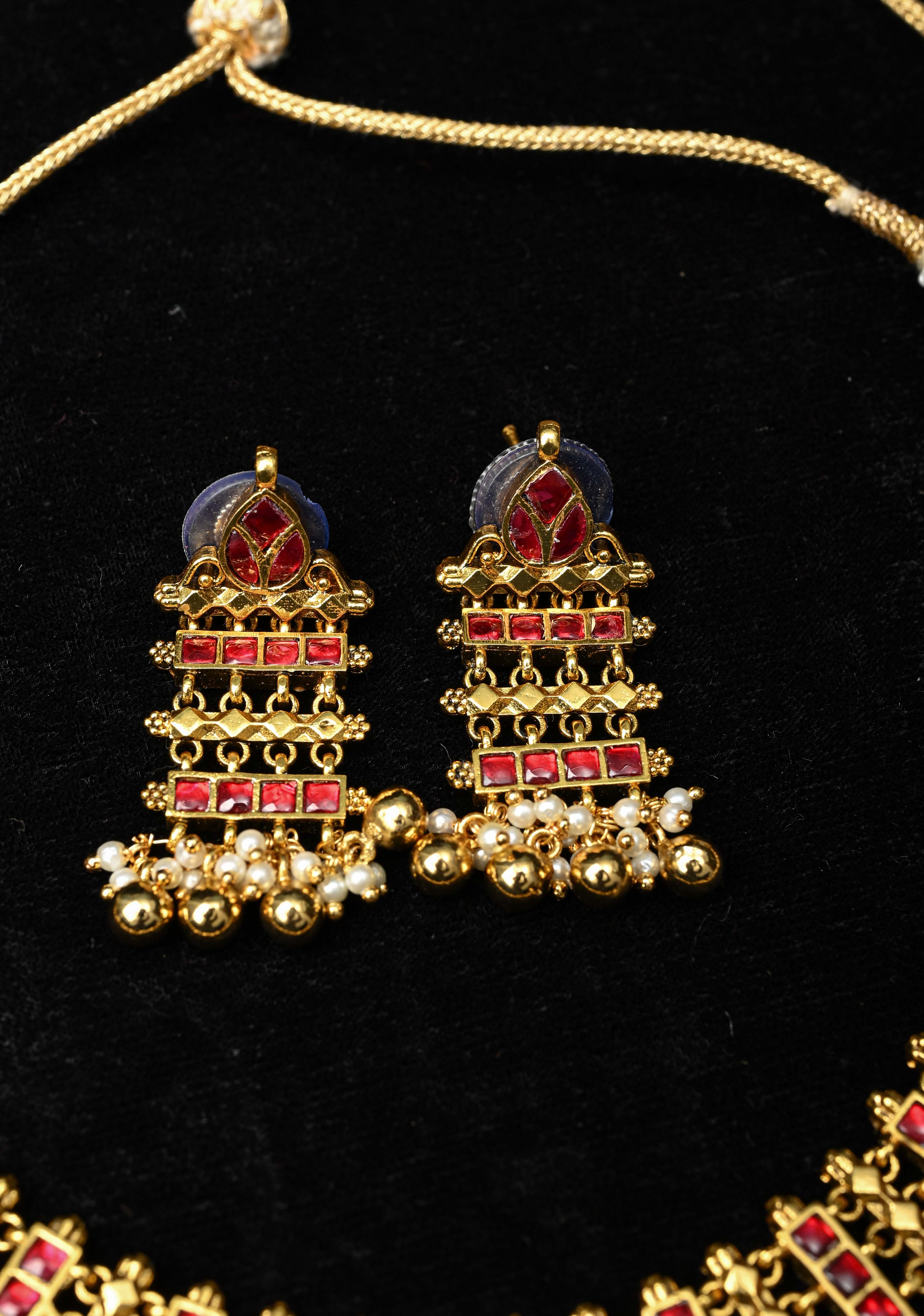 Ethnic Indian Choker Set with Red stone Embellishments and Beads Drops | SHOBITAM