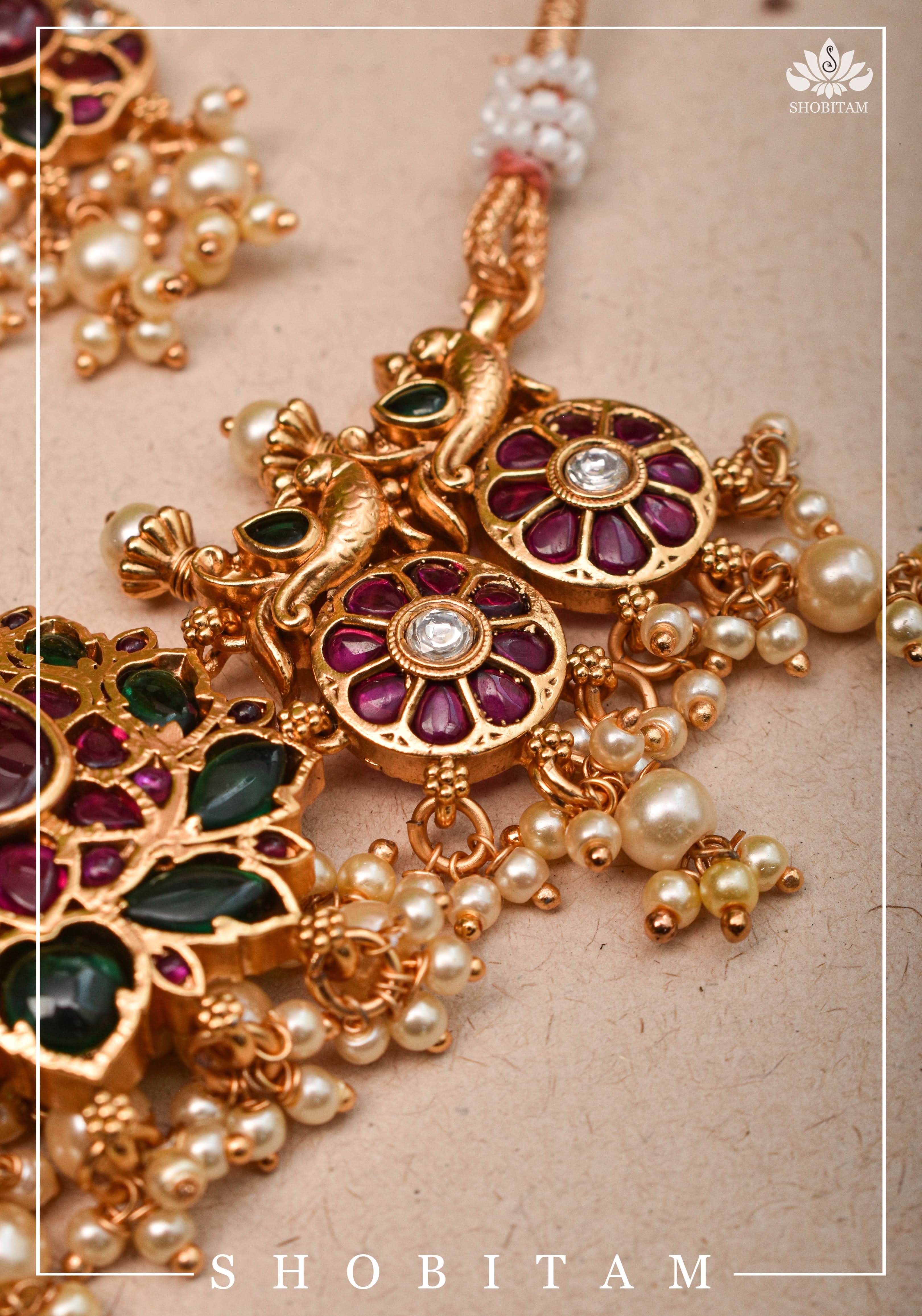Jadau Lotus Stone Embellishment with Peacock units Choker Set In Green,Pink and white With Matching Earrings | Shobitam