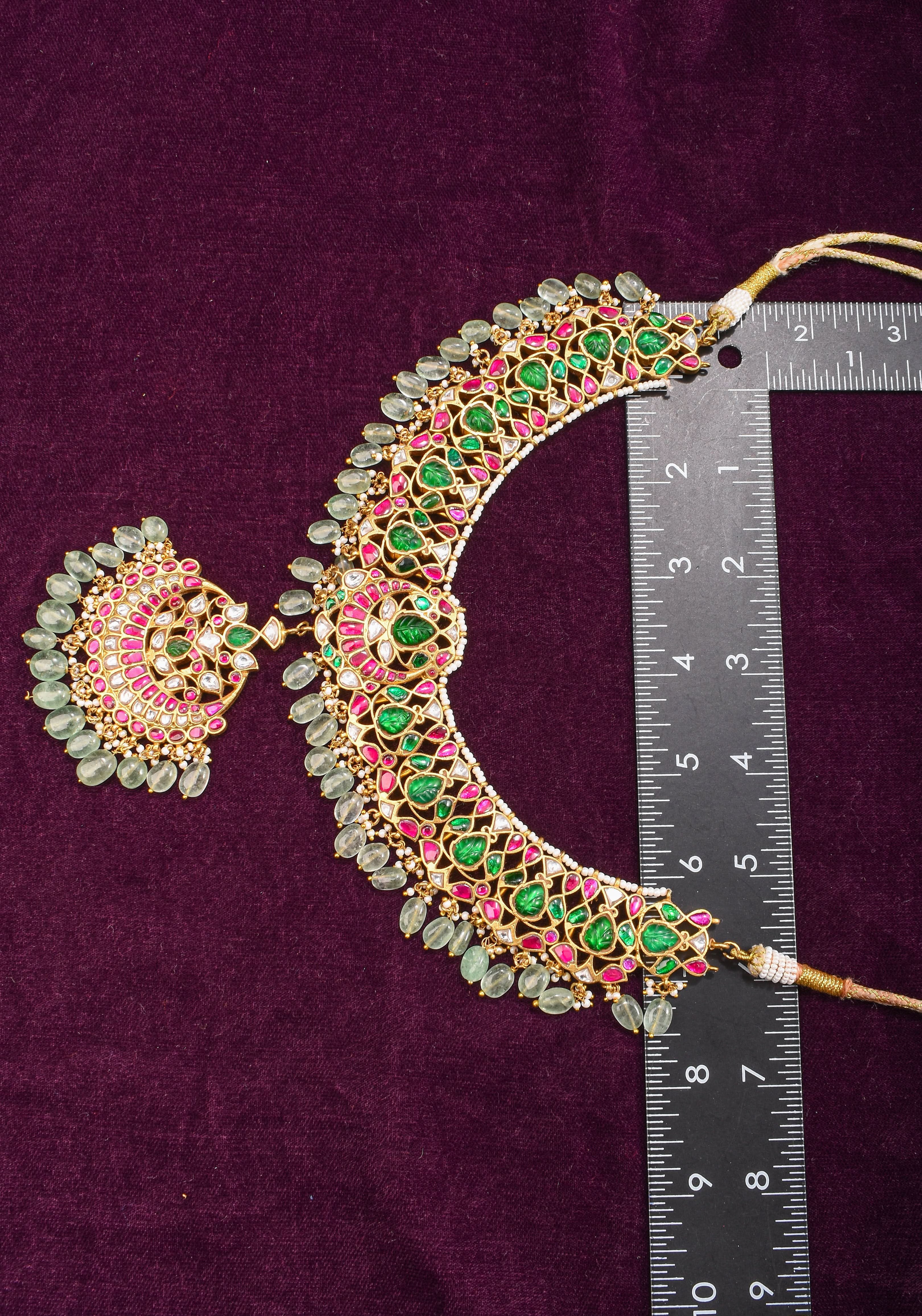 Exquisite Jadau Necklace with central pendant and sage dangling stones | SHOBITAM