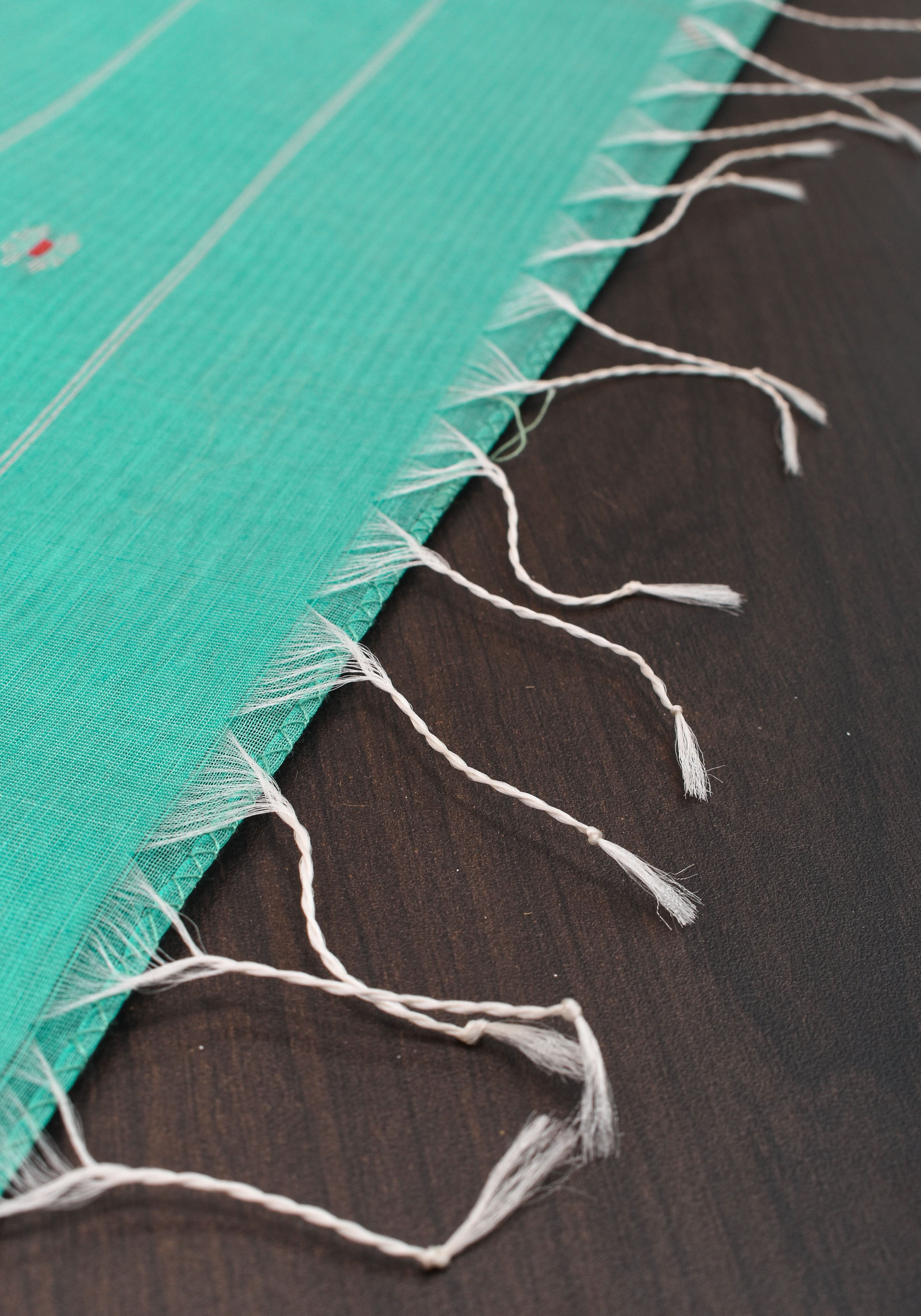 Handwoven Maheshwari Silk Cotton Saree in Teal with minimal zari borders| Sarees By Shobitam