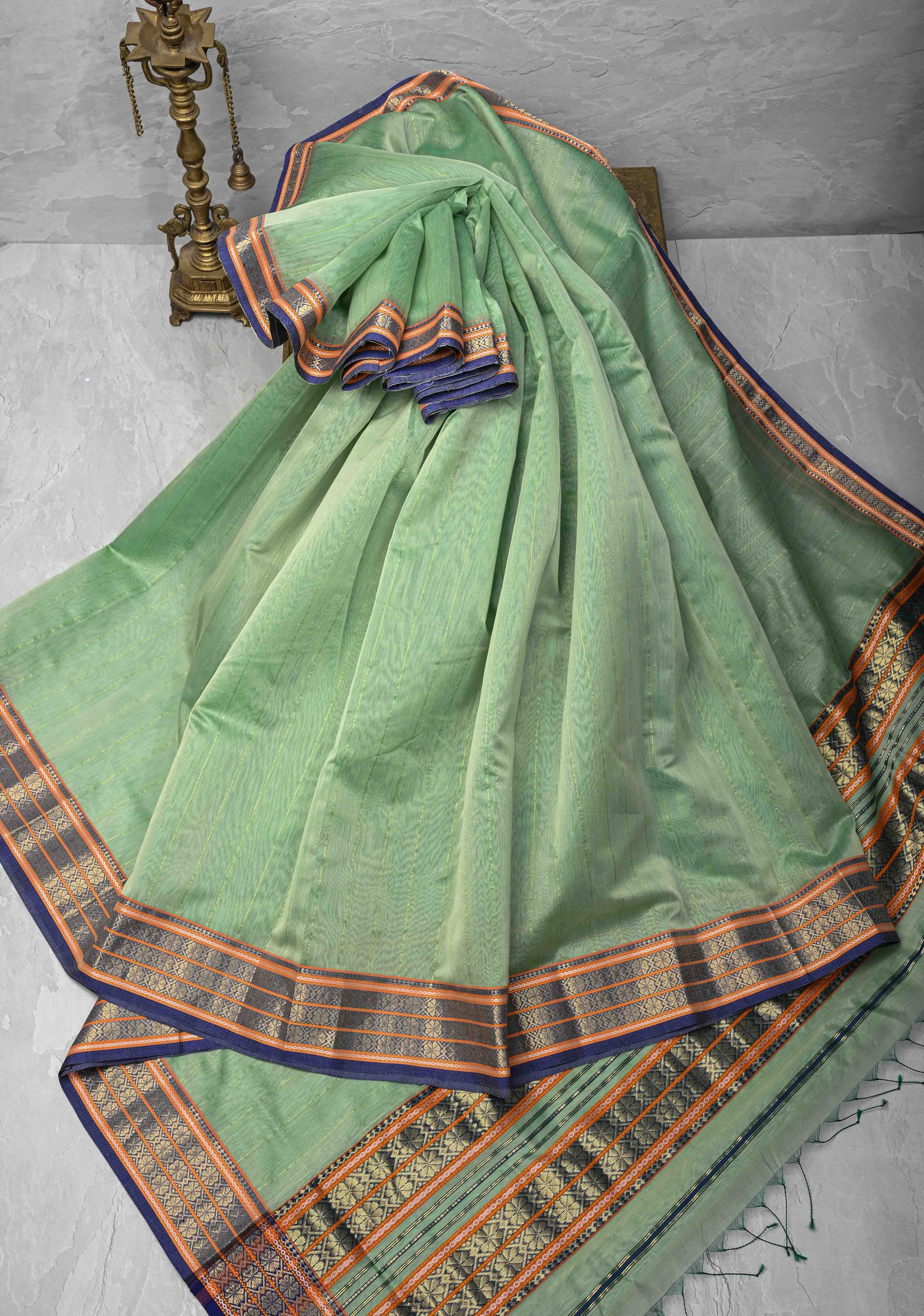 Mint Green Handwoven Maheshwari Silk Cotton Saree with Muted Stripes And Zari Border | Shobitam