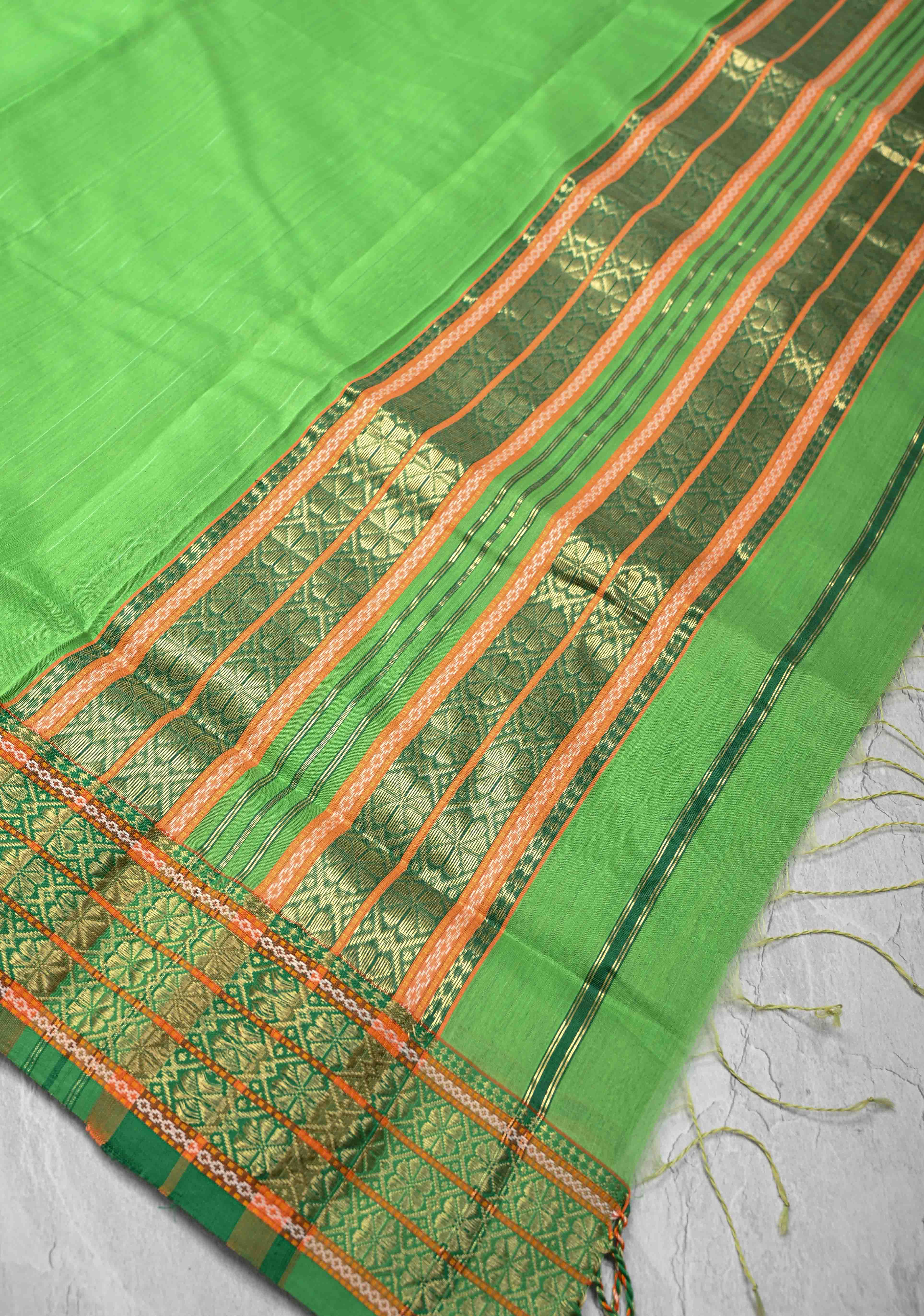 Parrot Green Handwoven Maheshwari Silk Cotton Saree with Muted Stripes and Zari Borders | Shobitam