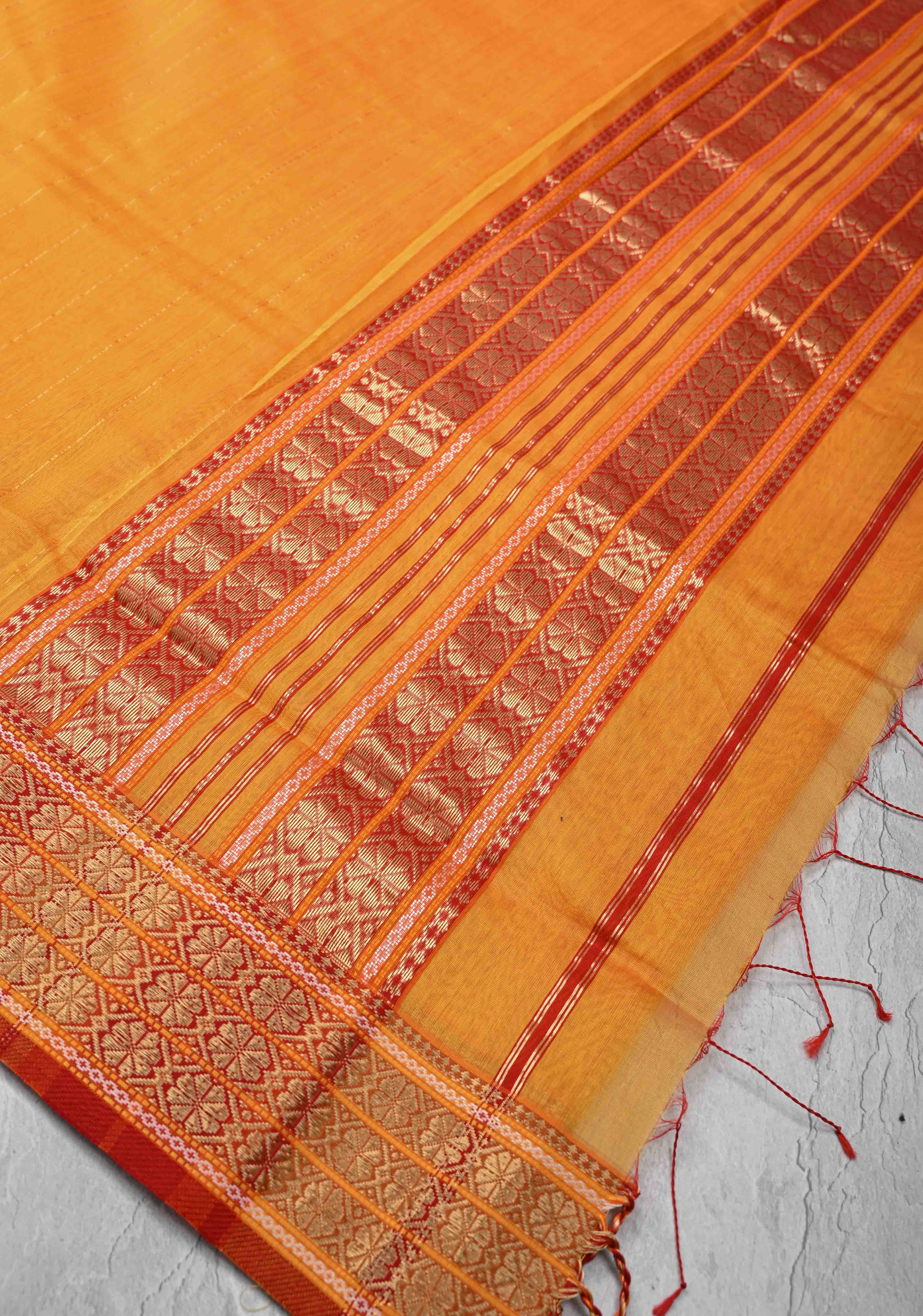 Mustard Yellow Handwoven Maheshwari Silk Cotton Saree with Muted Stripes and Zari Borders | Shobitam