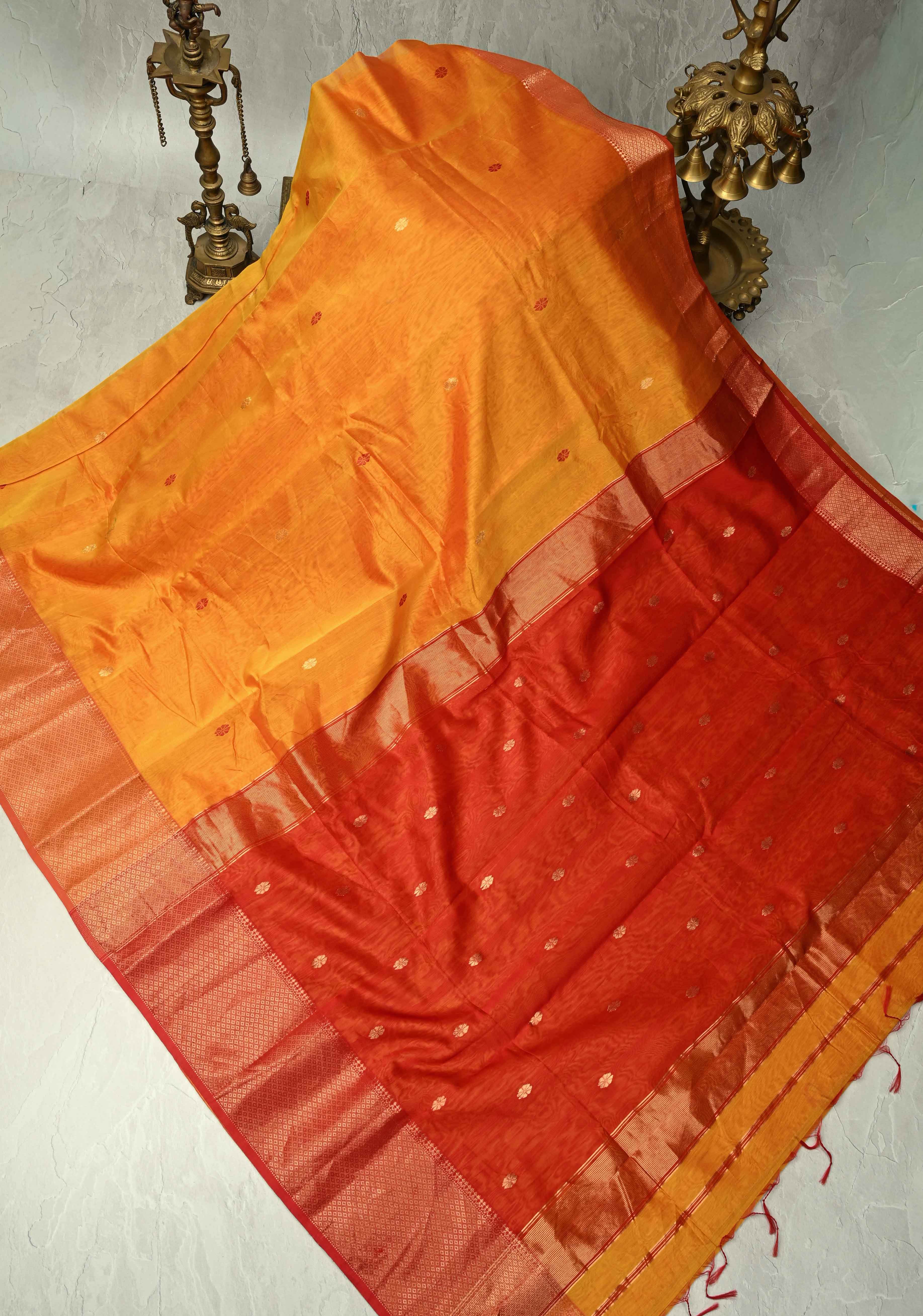 Yellowish Orange Dual Tone Handwoven Maheshwari Silk Cotton Saree with Resham Buttas and Contrast Border