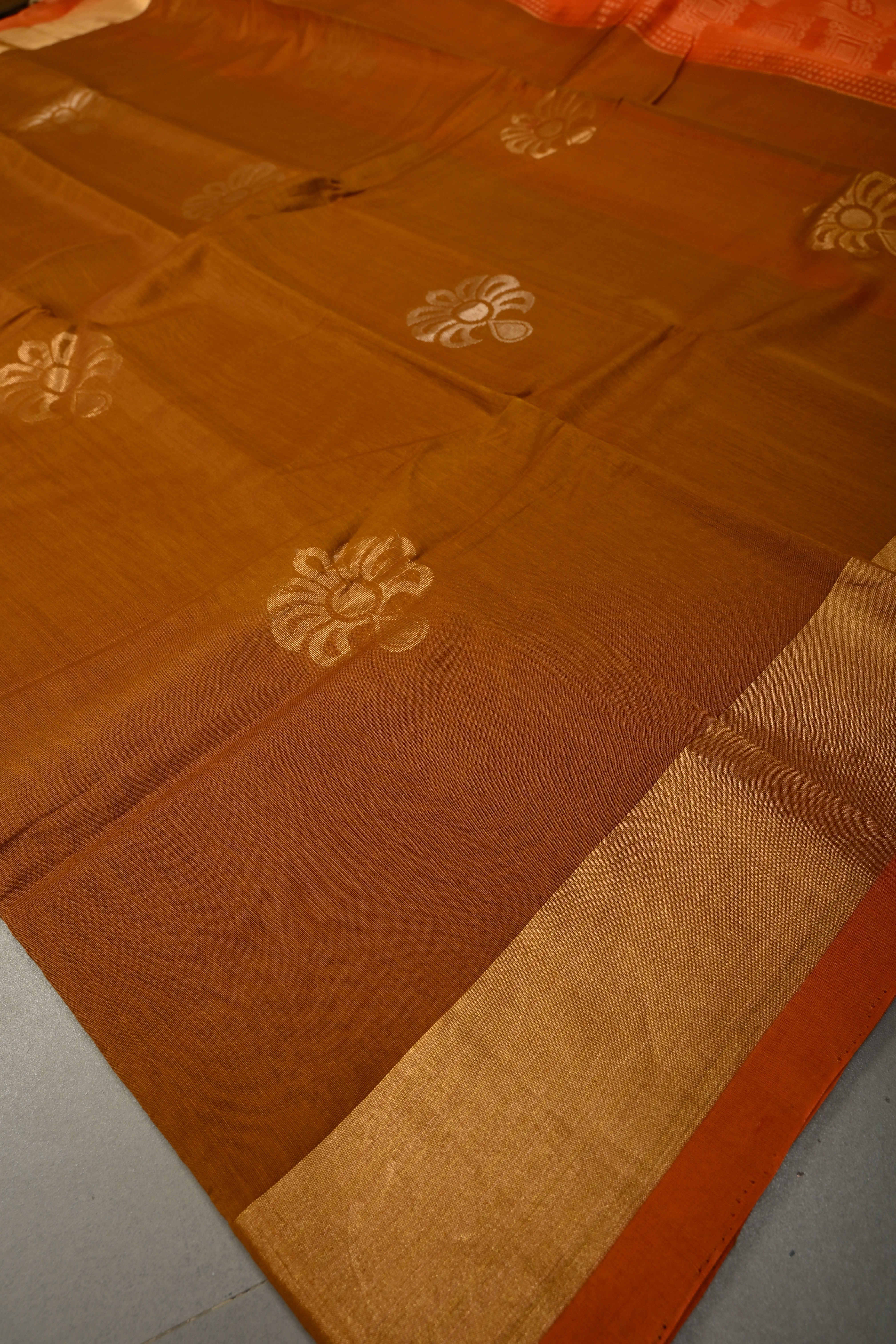 Brown Handwoven Maheswari Silk Cotton Saree with Floral Zari Buttas and Zari Border