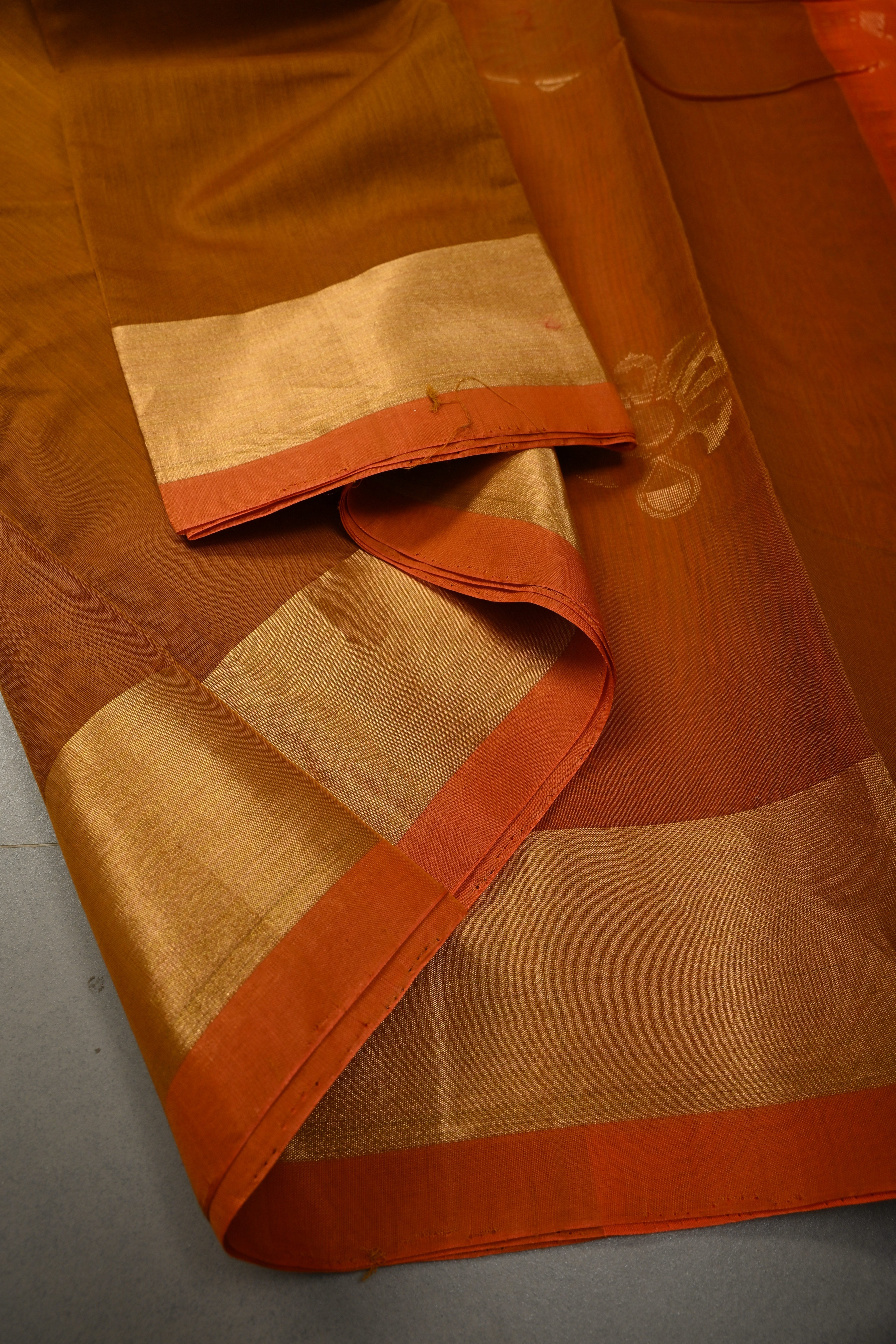 Brown Handwoven Maheswari Silk Cotton Saree with Floral Zari Buttas and Zari Border | Shobitam