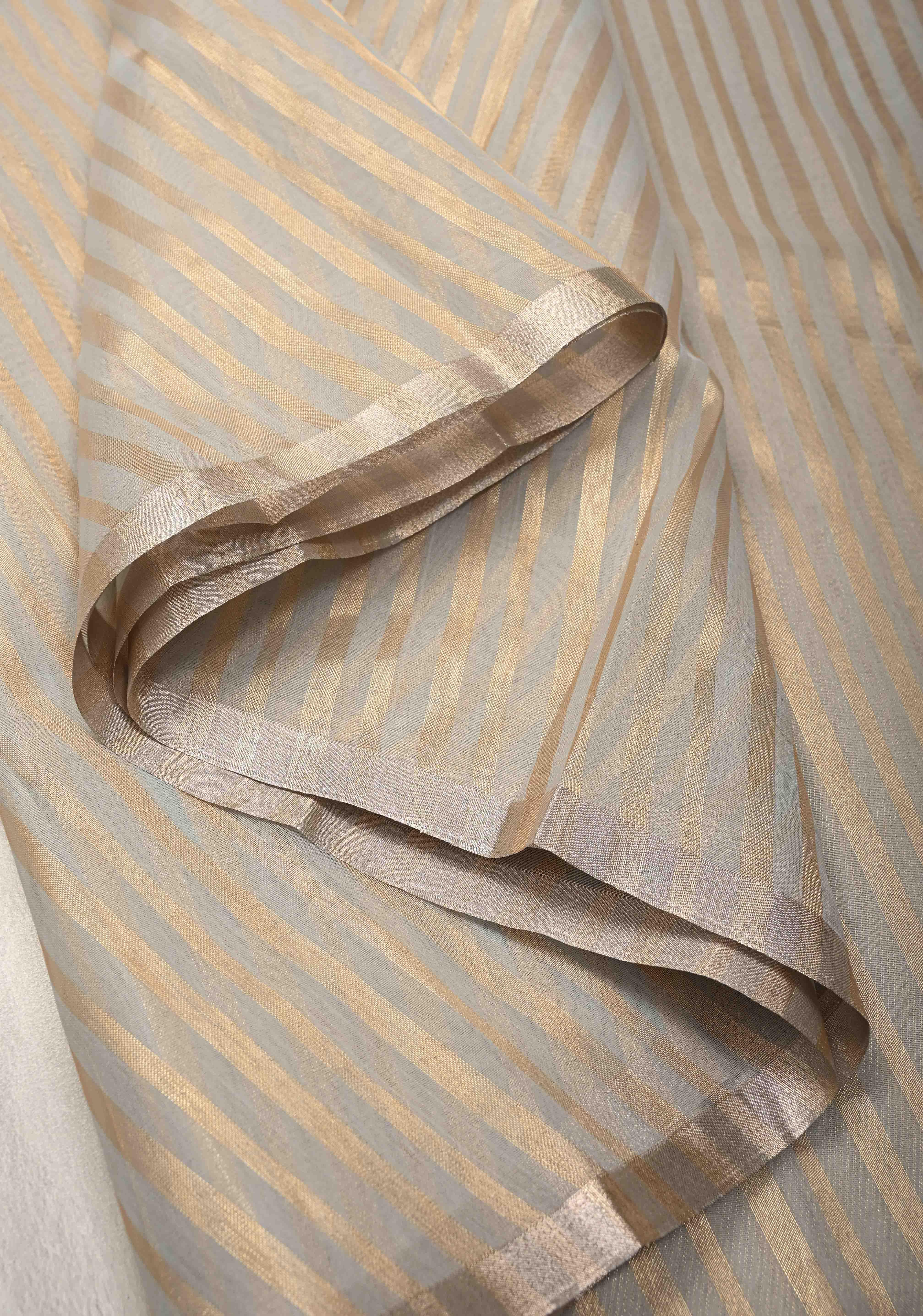 Grey Semi Kora Saree with Tissue Stripes and Minimal Zari Border | Shobitam