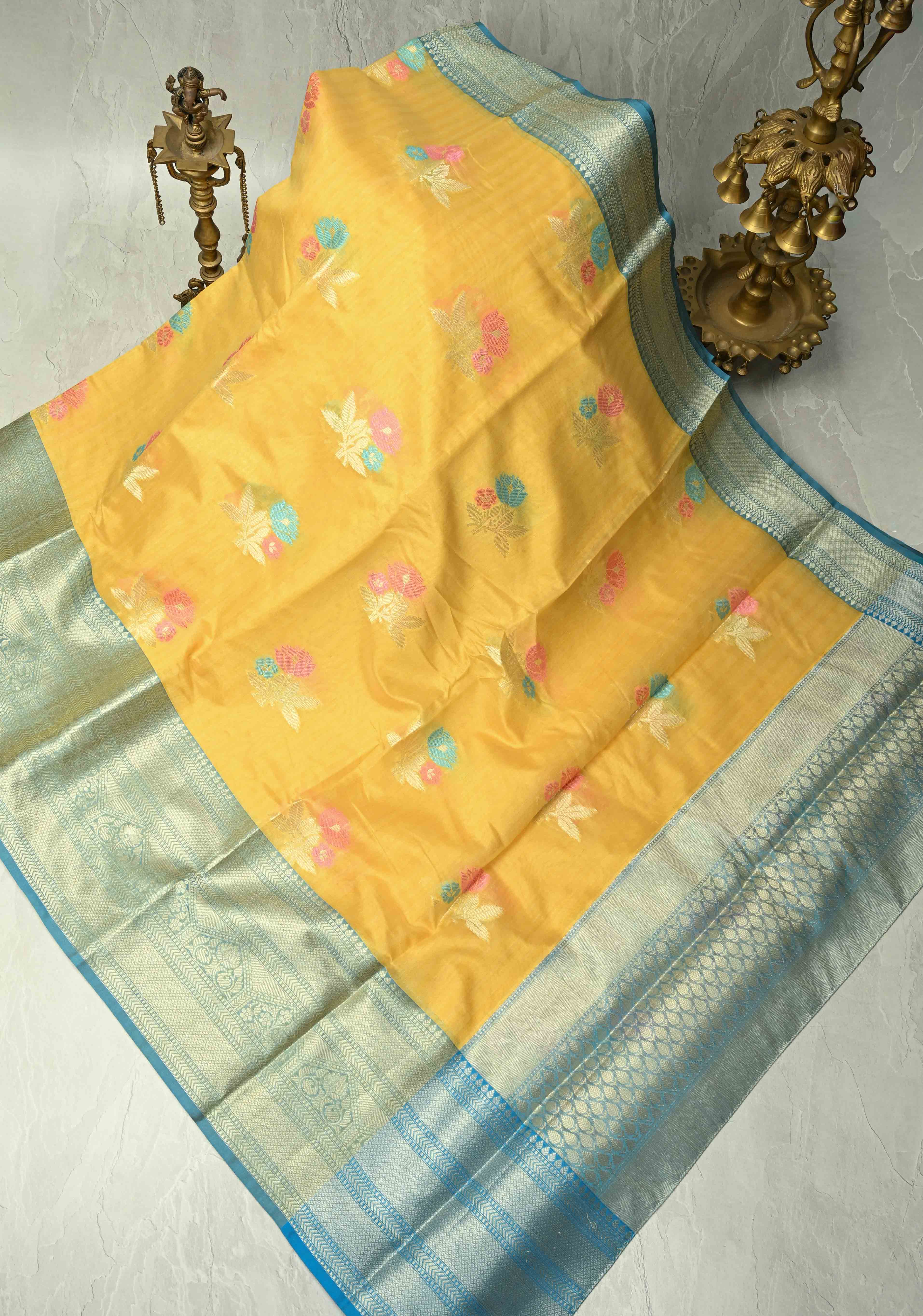 Mango Yellow Banarasi Semi Kora Saree with Meenakari Floral Buttas and Contrast Wide Zari Border | Shobitam