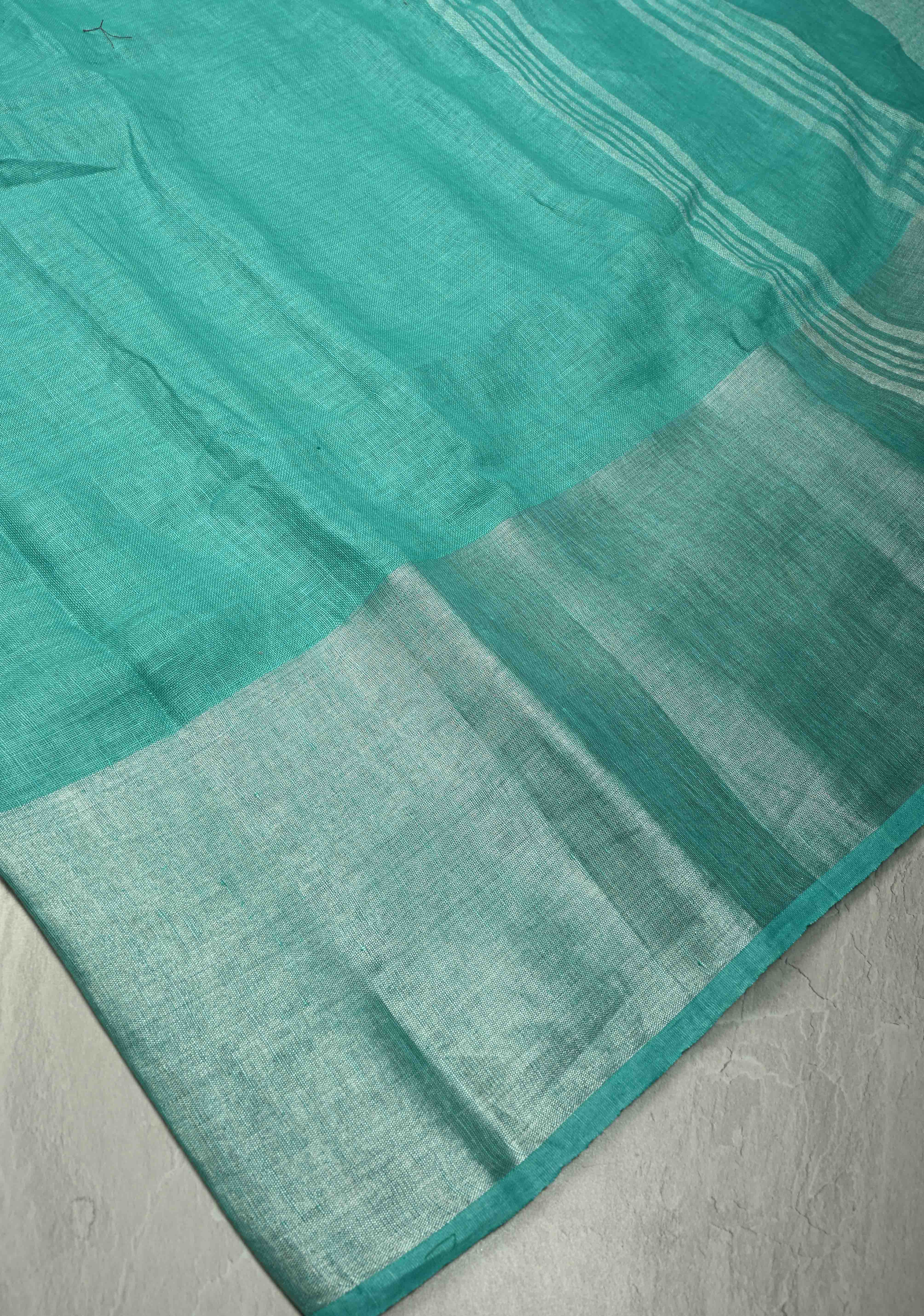 Turquoise Pure Linen by Linen Saree with Wide Zari Border | Shobitam