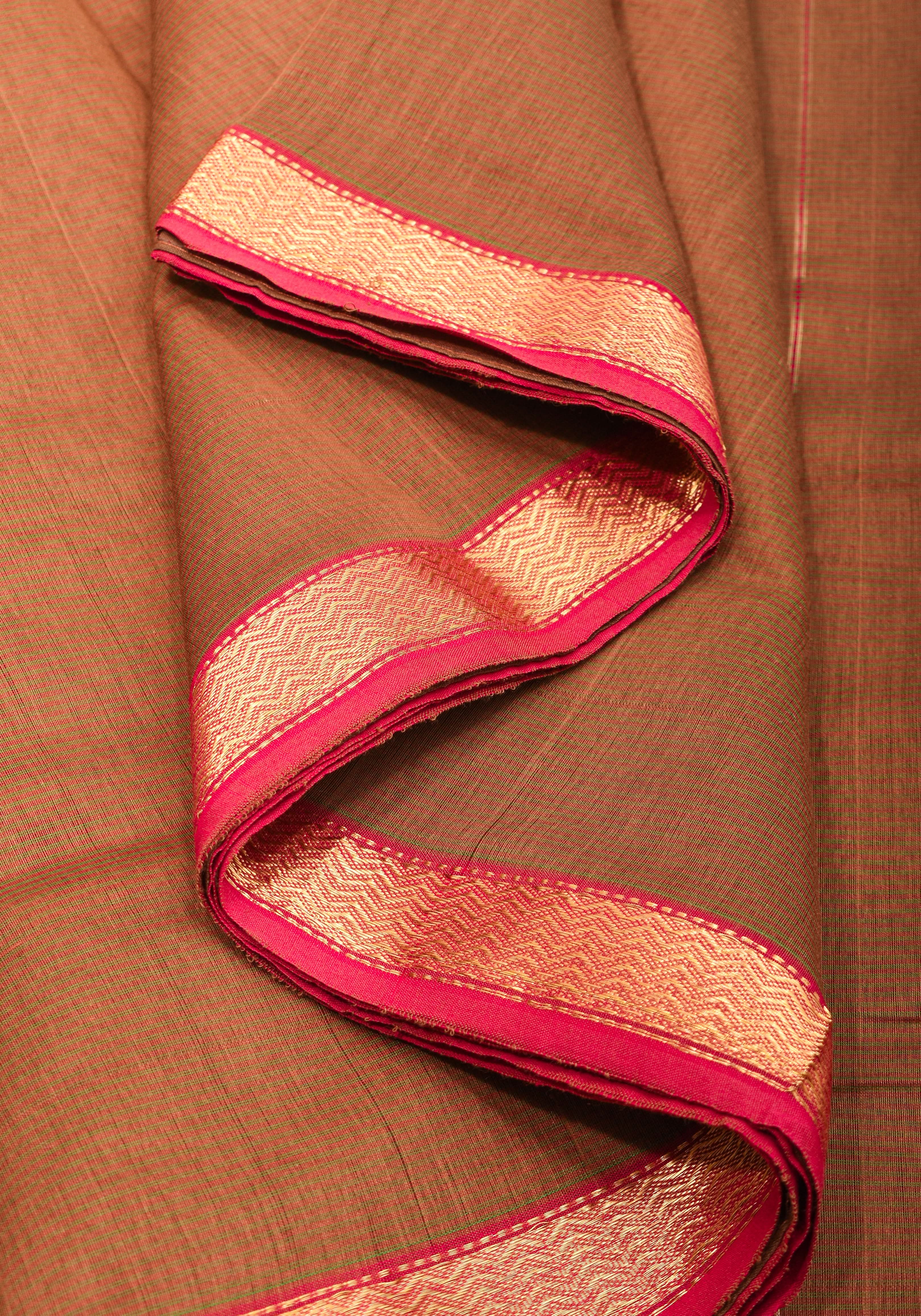 Handwoven Maheshwari Silk Cotton Saree in brown With Stripes & Minimal zari borders | Shobitam