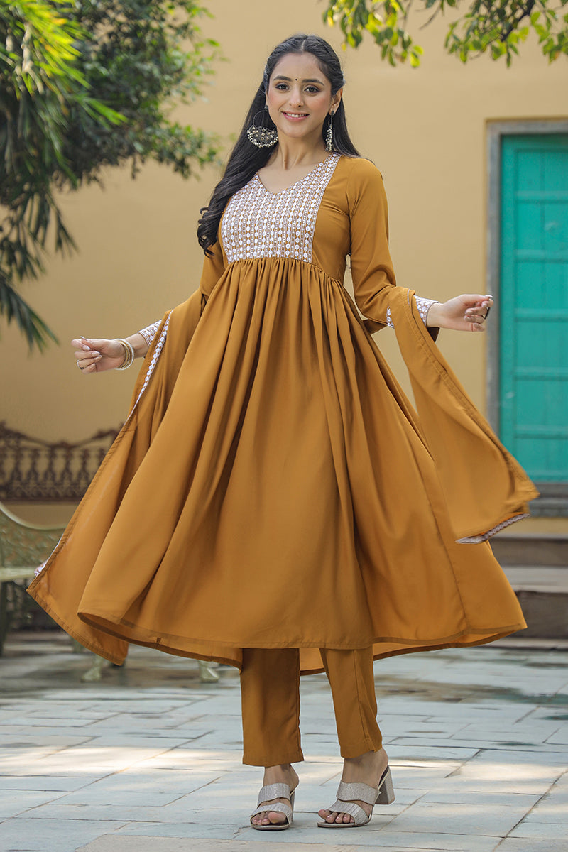Mustard Poly Georgette Yoke Design Suit Set | SHOBITAM