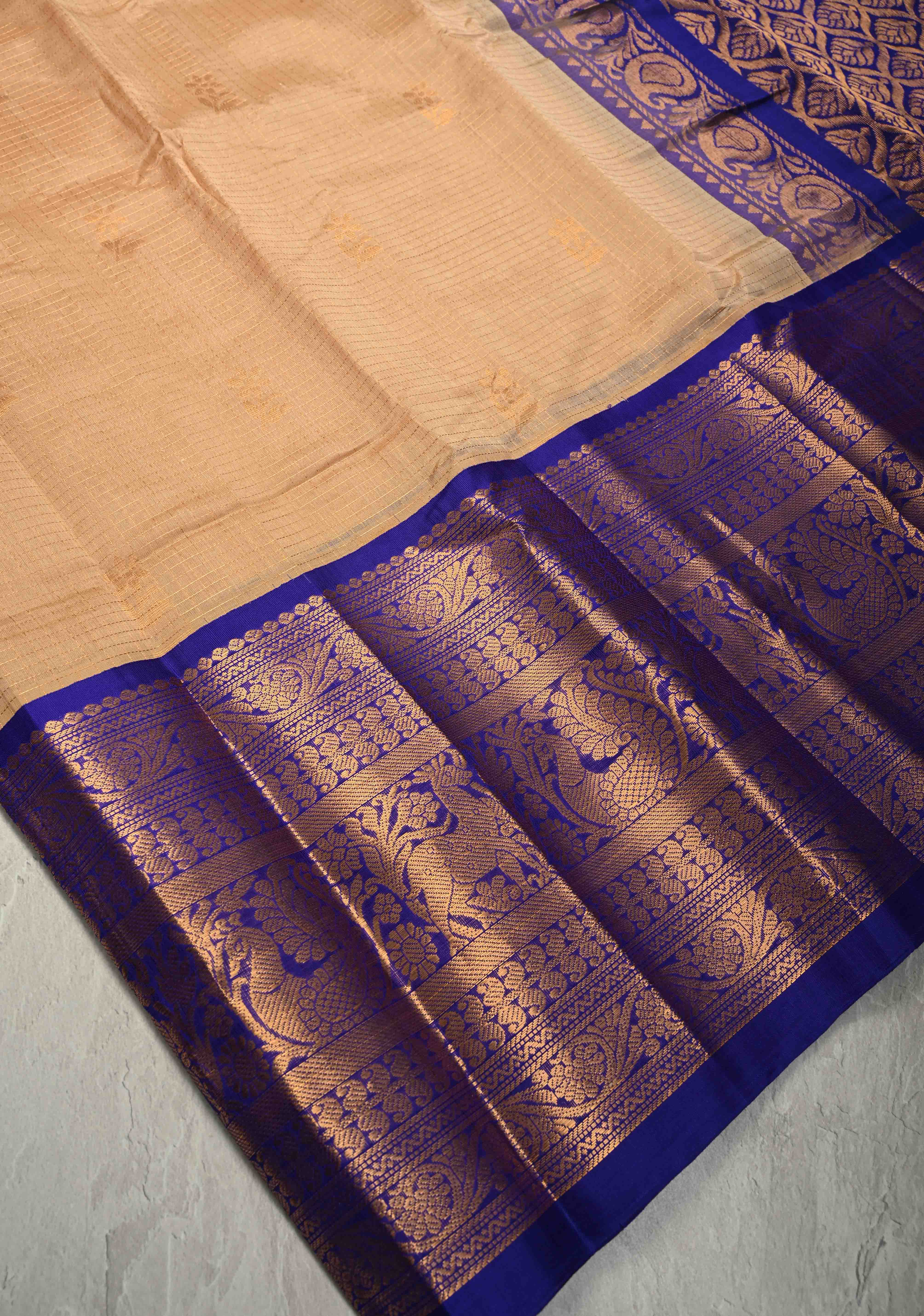 Ivory Zari Checks on Korvai Kanchi Silk Cotton Handloom Saree with Floral Zari Buttas and Contrast Wide Zari Border | Shobitam