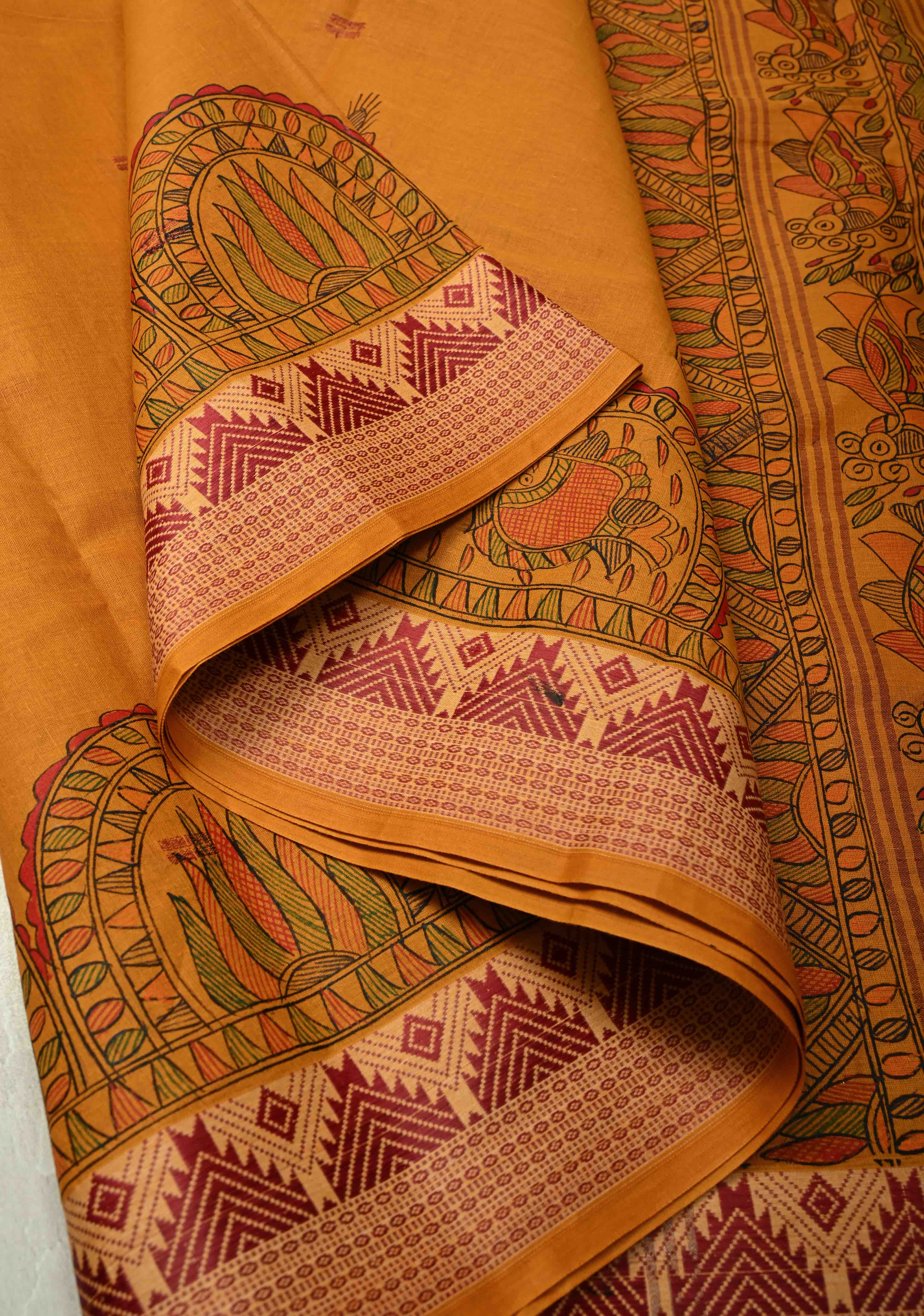 Musturd Yellow Madhubani Hand painted on Cotton Saree with Buttas and Border | Shobitam