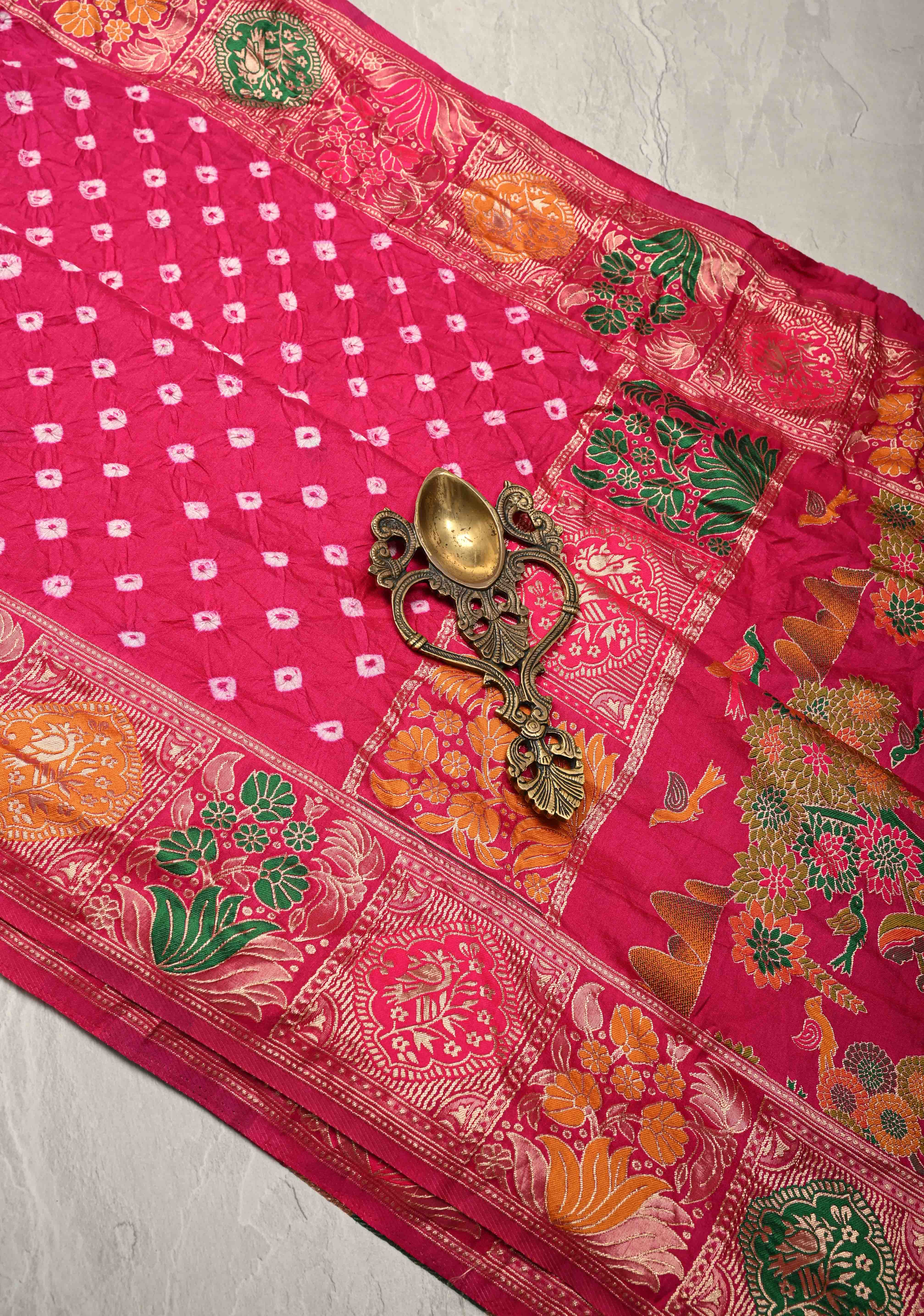 Fuchsia Pink Crushed Bandhini on Art Silk Saree with Meenakari Zari Border and Village Theme Pallu | Shobitam